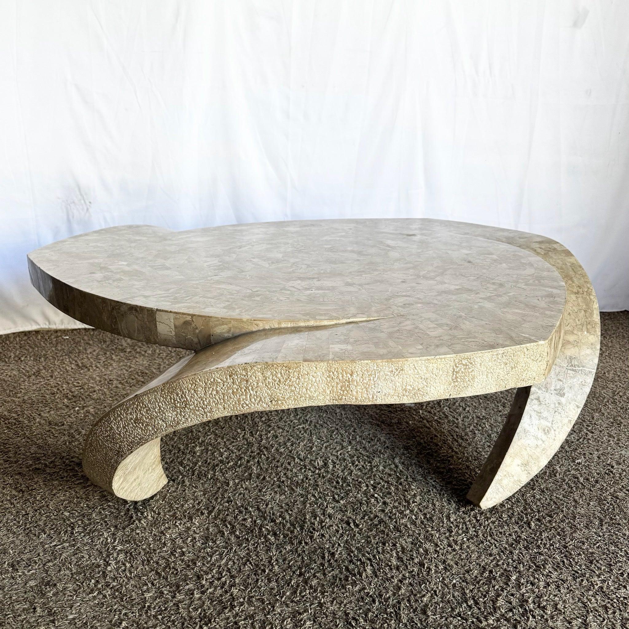 Postmodern Sculpted Tessellated Stone Table: circular polished stone luxury centerpiece for refined, modern interiors.
 

 Minor surface cracking and chips on the edges as can be seen in the photos.
 

 We sell items as acquired, without restoring