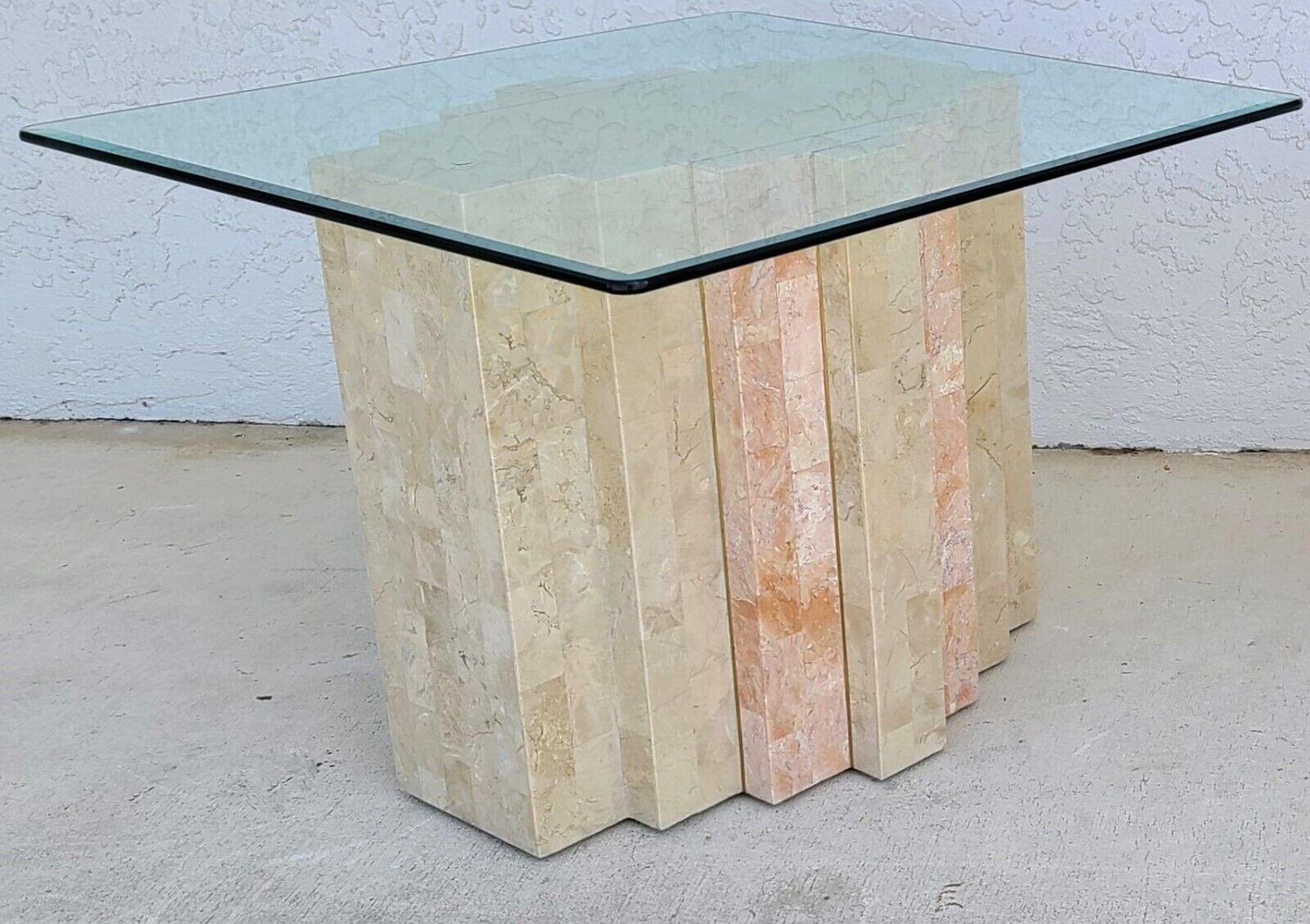 For FULL item description click on CONTINUE READING at the bottom of this page.

Offering One of our recent Palm Beach Estate Fine Furniture acquisitions of a MCM Maitland Smith style 2 tone tessellated stone brass inlay side end table

Approximate