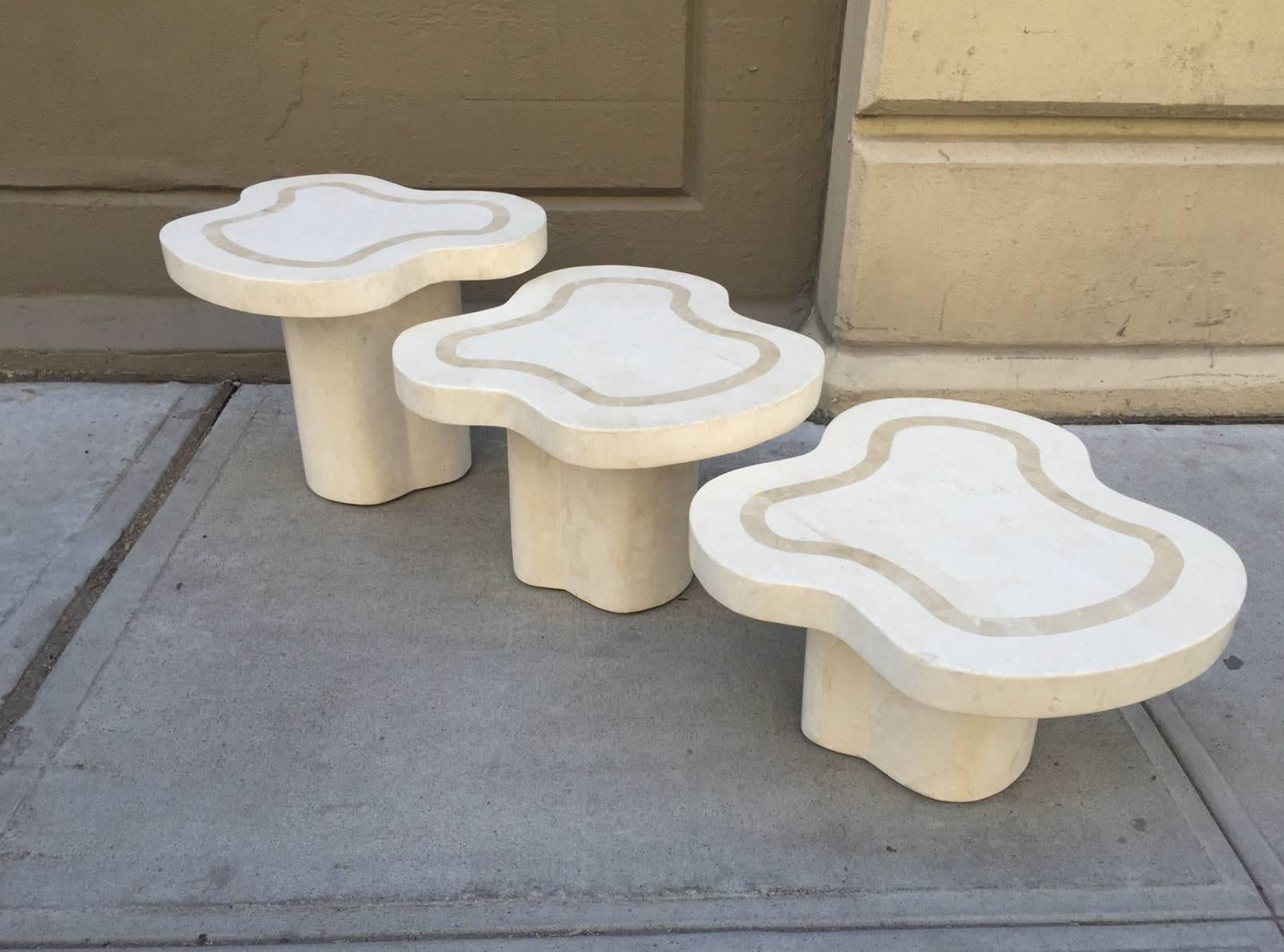 Tessellated fossil stone tables by Maitland-Smith.
Tallest table measures: 18