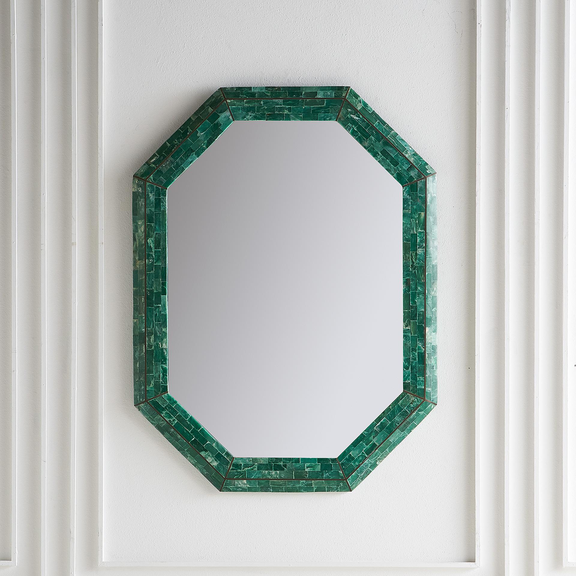A stunning mirror attributed to Maitland Smith with a beautiful tessellated marble frame in a striking shade of emerald green.

Dimensions: 30” W x 40” H

Condition: Excellent.