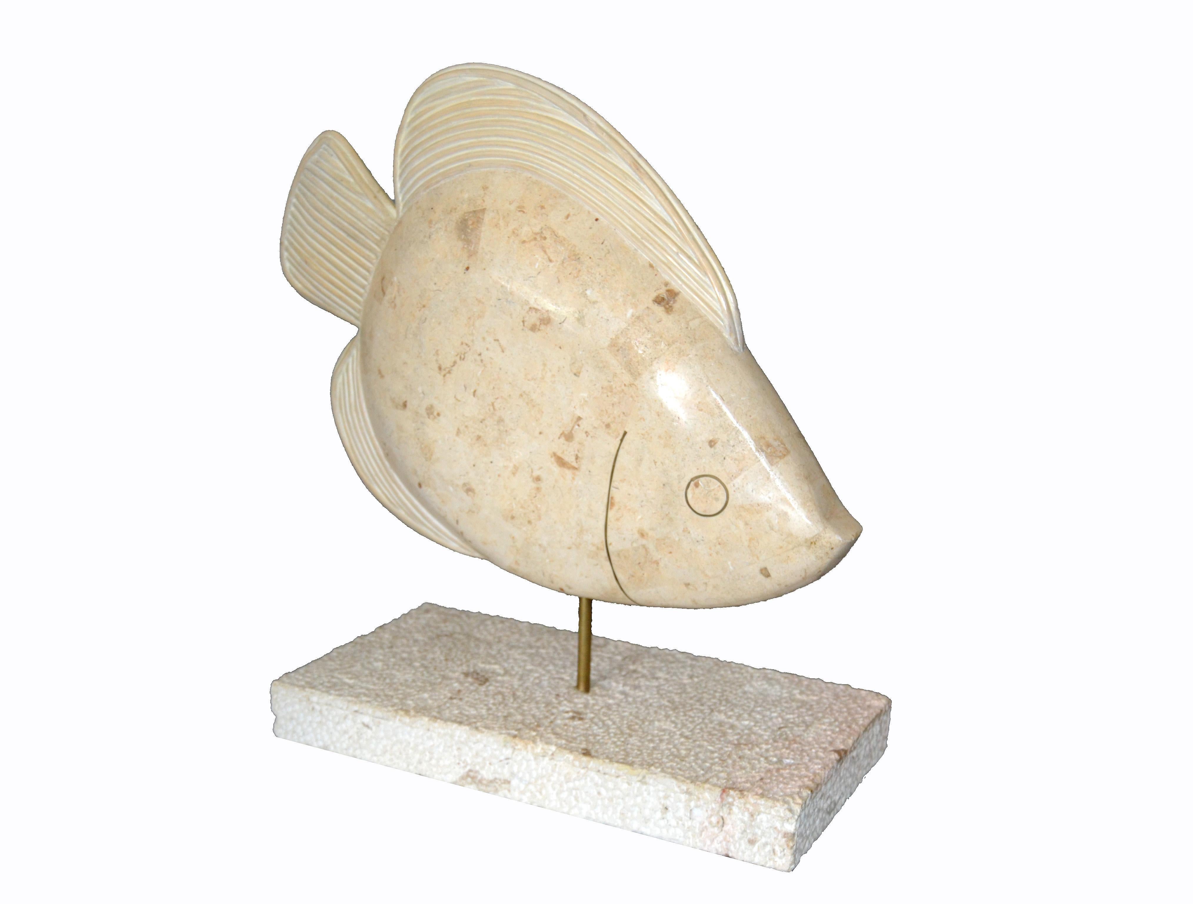 This is a Maitland-Smith tessellated horn and coral fish sculpture with brass details.
The fish is mounted on a coral base with a brass rod.
It is marked underneath, Made in Philippines.