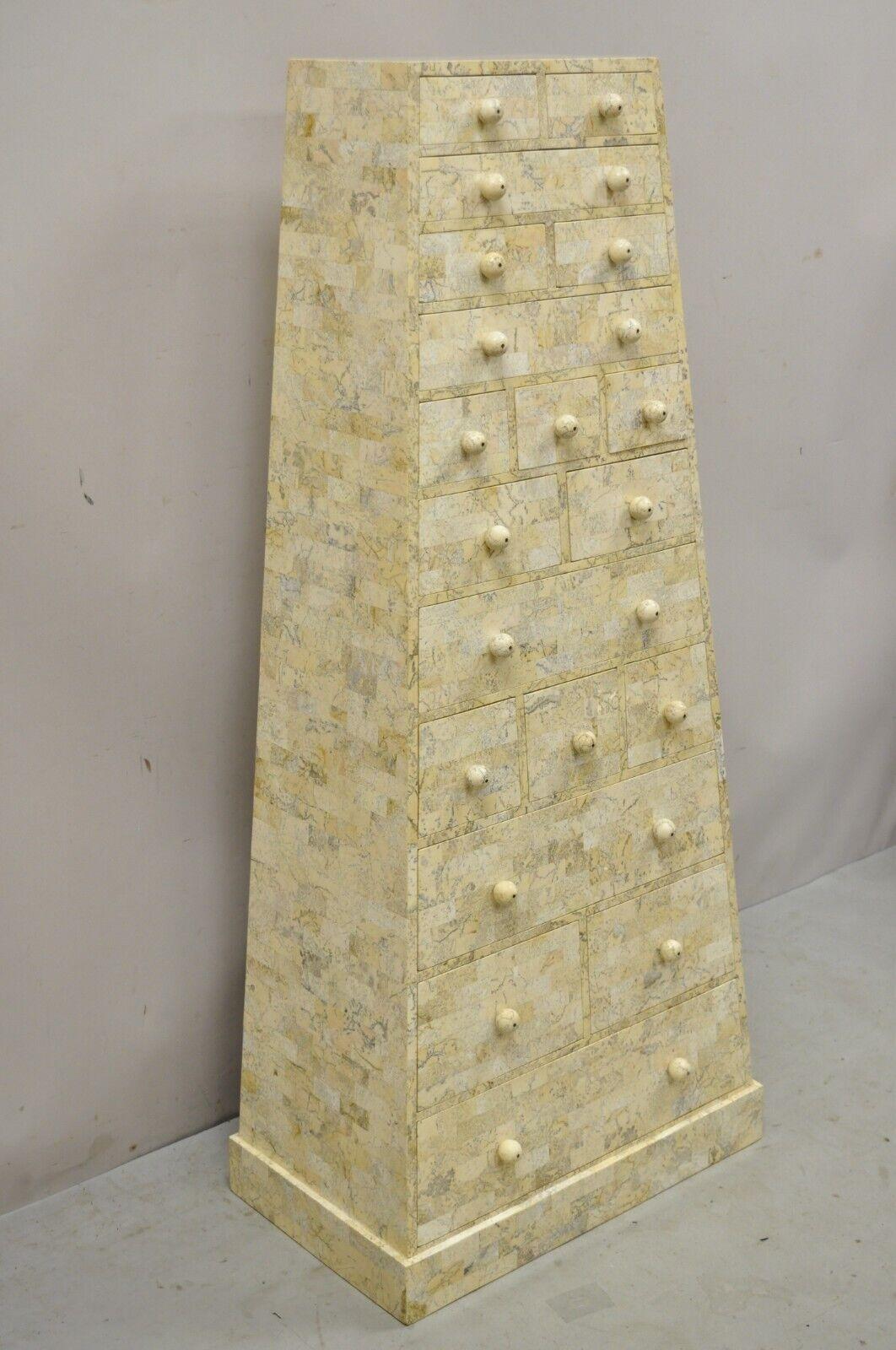 Maitland Smith tessellated marble stone pyramid chest of drawers. Item features tessellated stone marble inlay, asymmetrical pyramid shape, finished back, original label, 19 drawers, very nice vintage item, quality craftsmanship, great style and