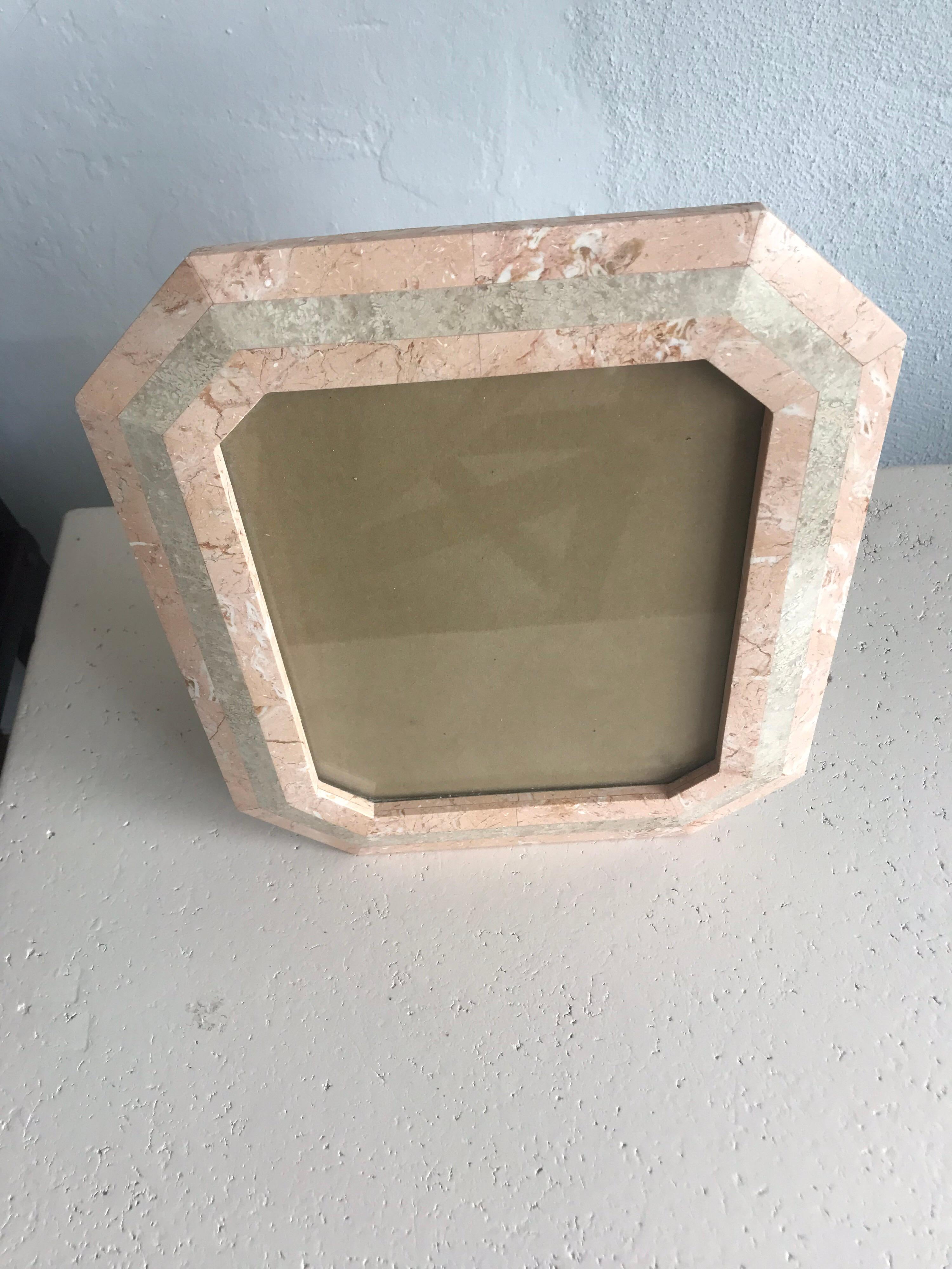 Picture or photo frame rendered in tessellated marble, stone, travertine, by Maitland Smith, 1980s

Fits an 8x10 photo.