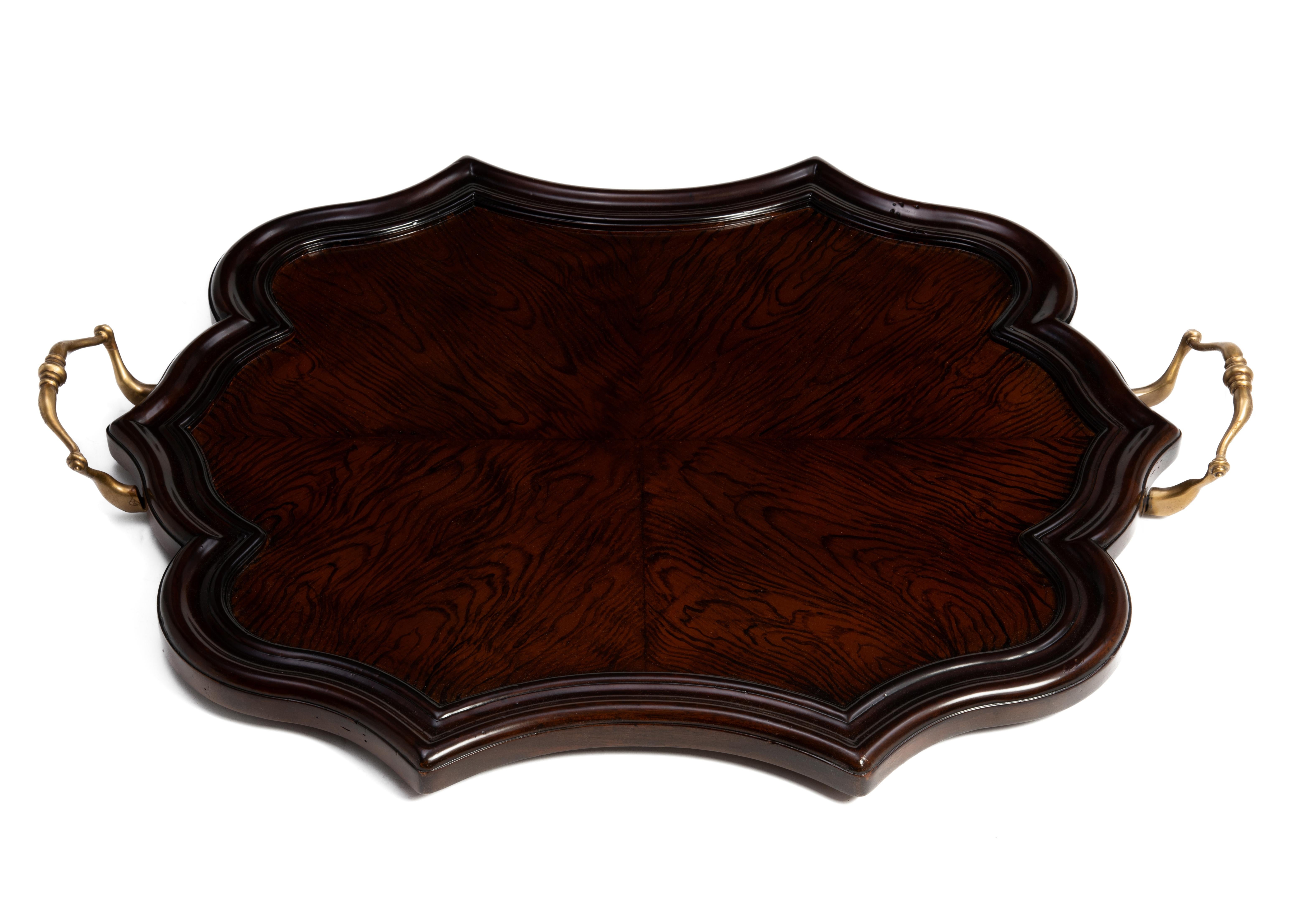 A discontinued Maitland Smith wood and brass tray. Four book matched sections, scalloped edge and brass handles. Made in the Philippines in 2013.