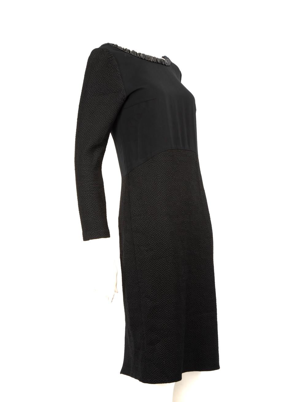 CONDITION is Very good. Minimal wear to dress is evident. Minimal wear to the internal front neckline where discolouration can be seen. There is are some loose threads on the left under arm. Small tear above the side zip and minor discolouration is