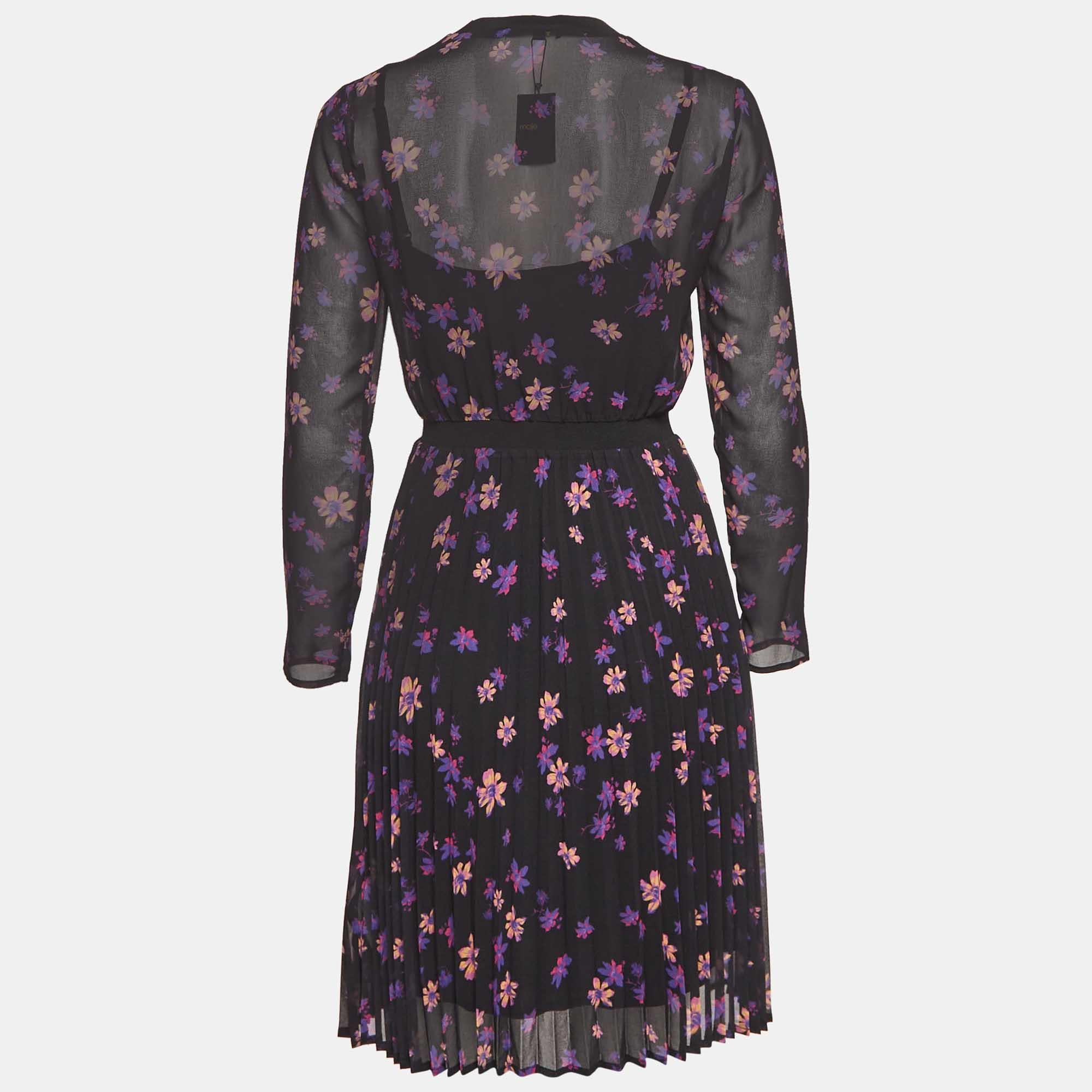 This stylish midi dress exudes elegance and sophistication. Its flattering length falls between the knee and ankle offering a versatile option for various occasions. With its chic design it combines modern trends with timeless charm making it a must
