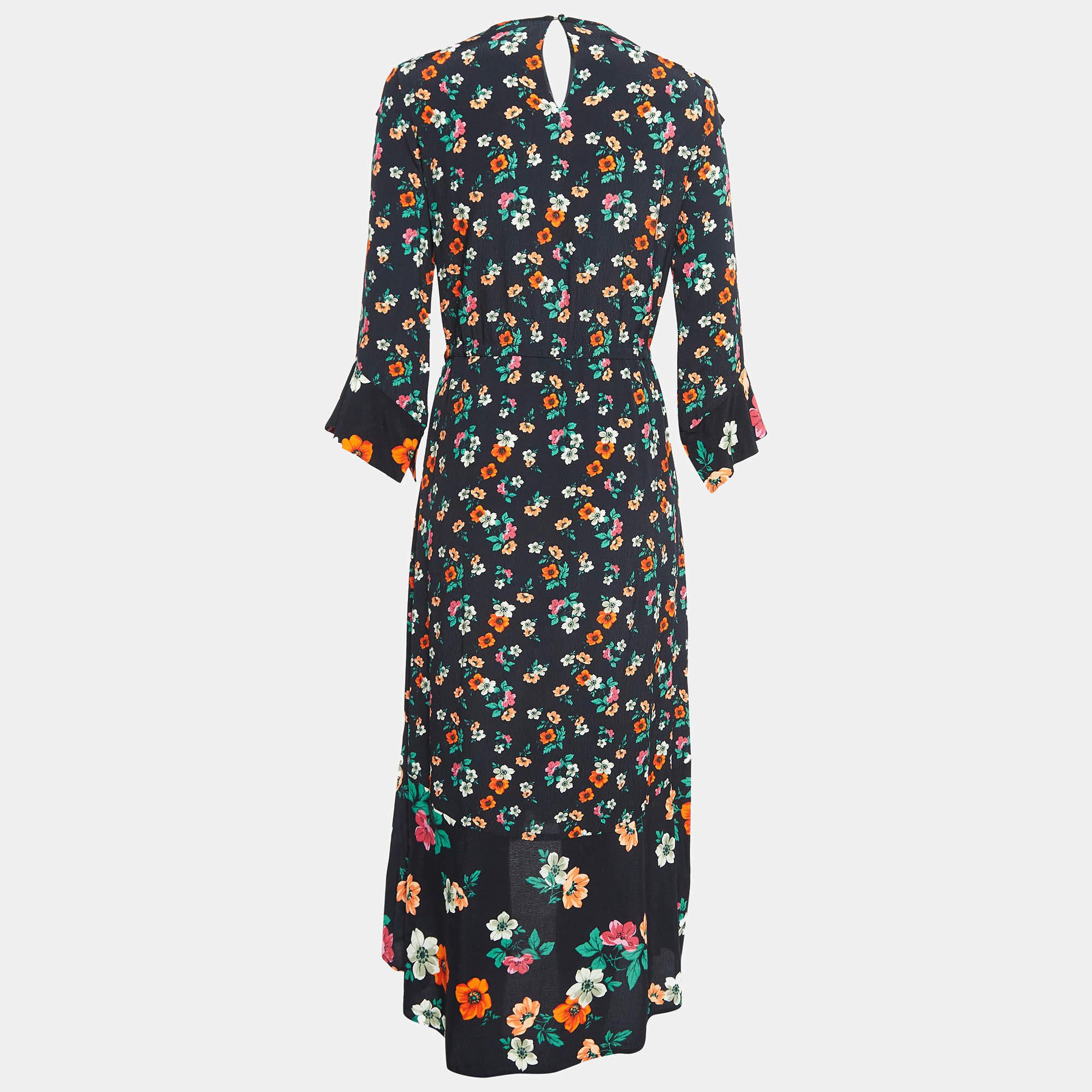 This stylish midi dress exudes elegance and sophistication. Its flattering length falls between the knee and ankle offering a versatile option for various occasions. With its chic design it combines modern trends with timeless charm making it a must