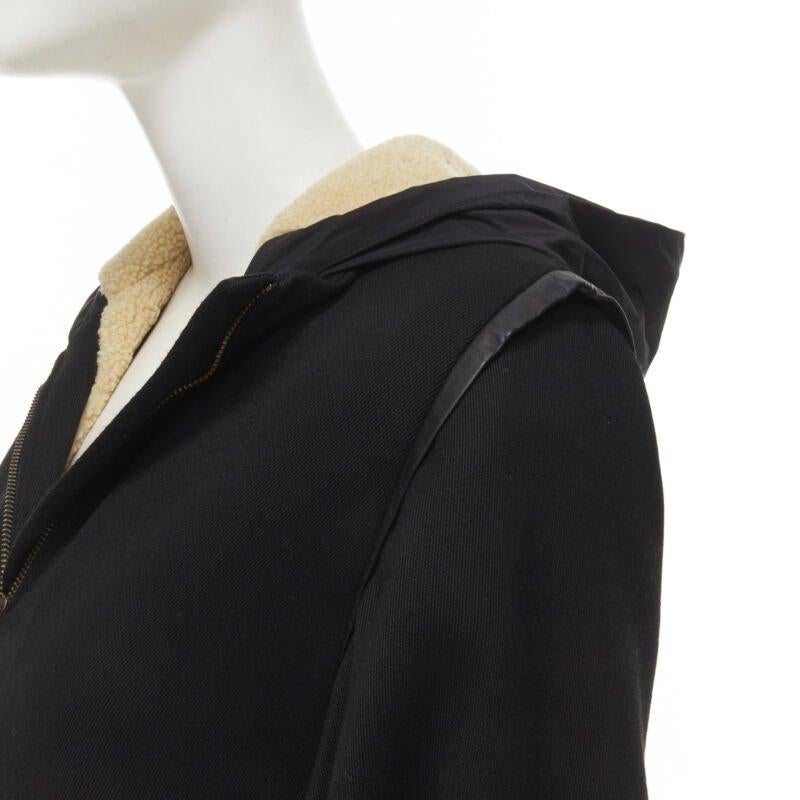 MAJE nero Cappotto posteriore svasato completamente foderato in pelle FR36 S
Riferimento: KNLM/A00072
Marchio: Maje
Materiale: Poliestere, Viscosa, Pelle di agnello
Colore: Nero, Marrone
Modello: Tinta unita
Chiusura: zip
Fodera:  Shearling
Dettagli