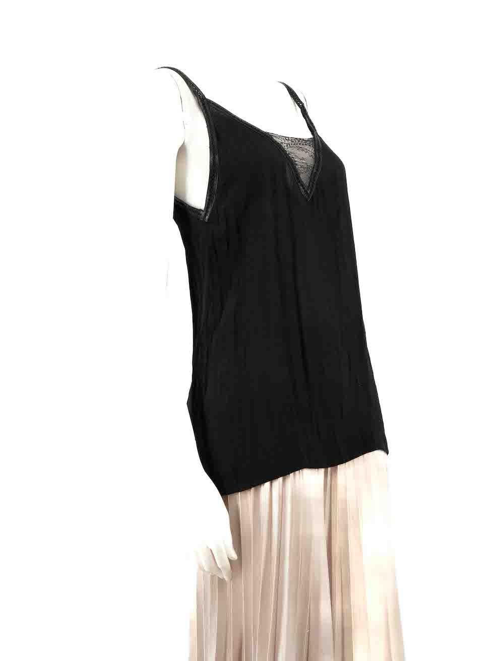 CONDITION is Very good. Minimal wear to top is evident. There is a small pluck to the weave at the front of the top on this used Maje designer resale item.
 
 Details
 Black
 Viscose
 Tank top
 Lace front panel
 Leather straps and trim
 Sheer
 
 
