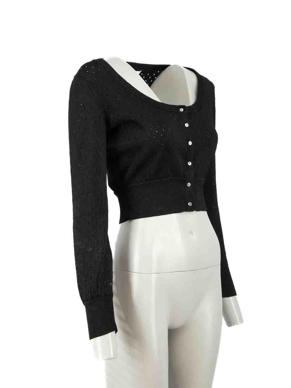 CONDITION is Good. Minor wear to cardigan is evident. Light wear to the knit with small plucks to the weave on this used Maje designer resale item.
 
Details
Black
Viscose
Cropped cardigan
Knitted and stretchy
Metallic accent
Dotted cut out holes