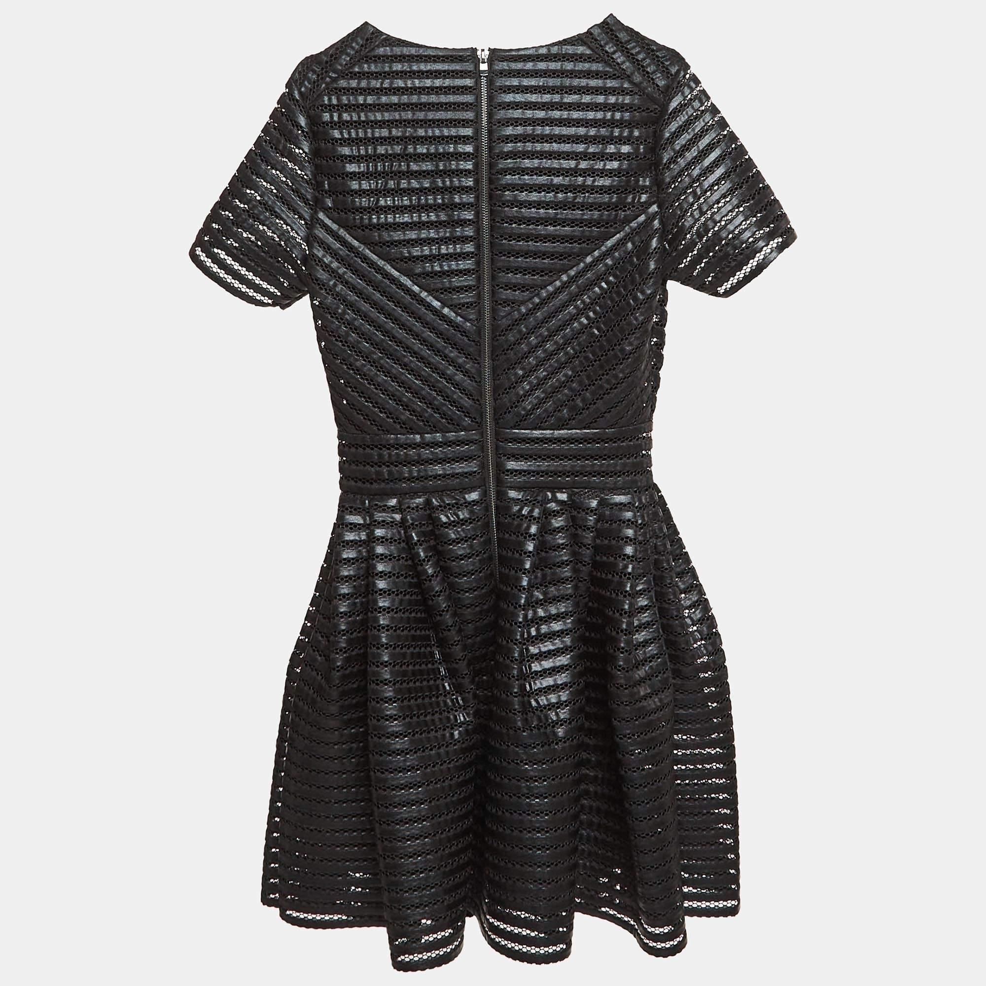 This designer dress is a chic and stylish garment that exudes elegance and sophistication. With its sleek design flattering silhouette and high quality craftsmanship this dress is perfect for any special occasion or evening event ensuring you stand