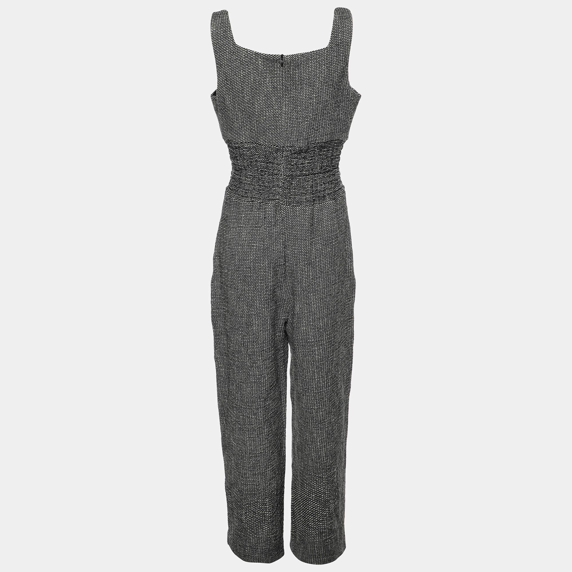 Bring in a touch of sophistication and elegance to your look by wearing this jumpsuit. A flattering neckline  classy hue  and noticeable details define this jumpsuit. Style it with high heels.