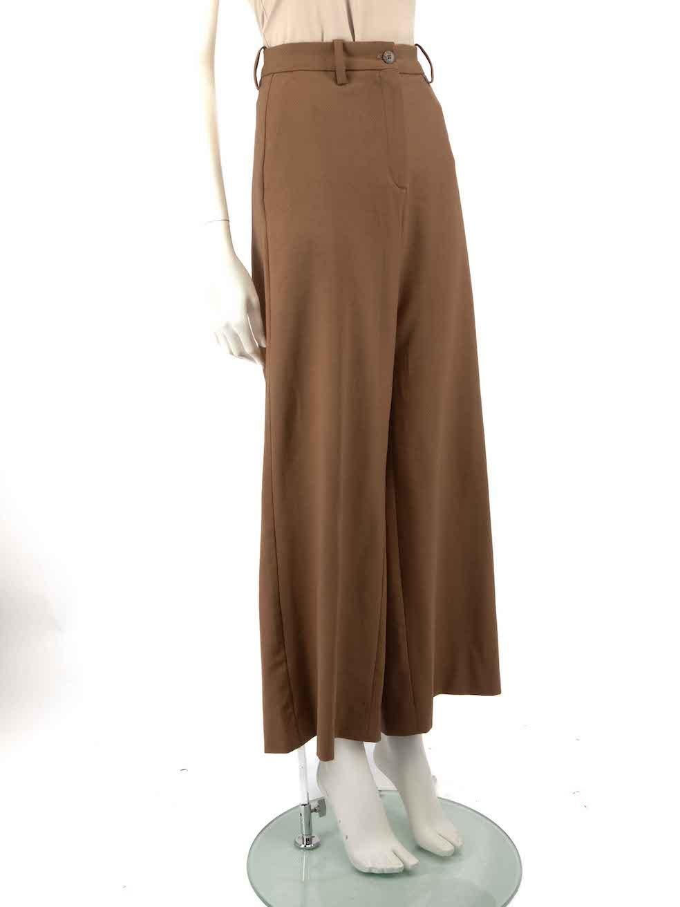CONDITION is Good. Minor wear to trousers is evident. Light signs of discolouration to crotch area and left leg hem line on this used Maje designer resale item.
 
 
 
 Details
 
 
 Brown
 
 Wool
 
 Trousers
 
 Wide leg
 
 High rise
 
 2x Side