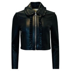 Maje Gekürzte Bikerjacke aus Leder mit Rüschen.