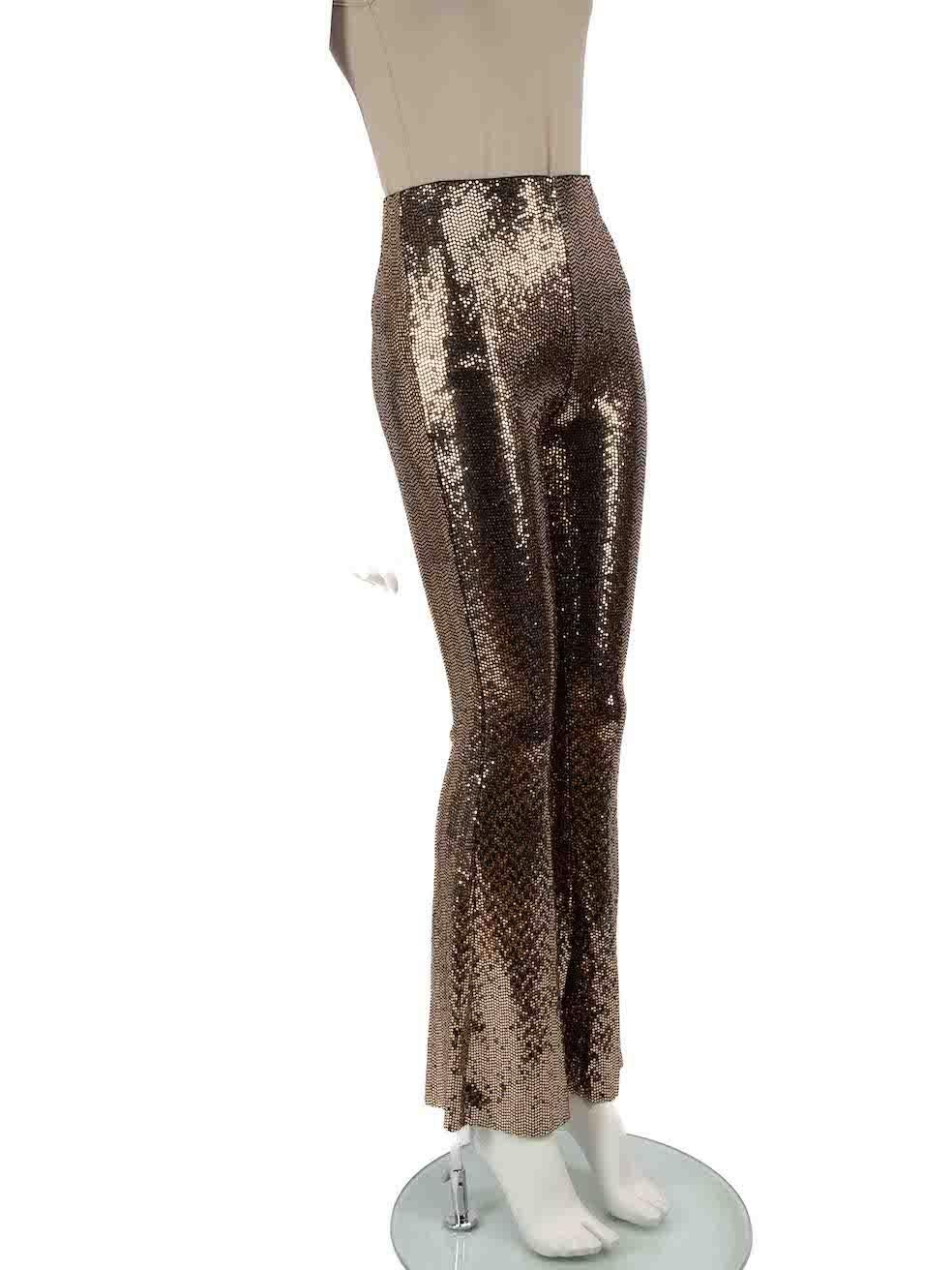 CONDITION is Very good. Minimal wear to trouser is evident. Minimal wear to sequins on waistband with some missing on this used Maje designer resale item.
 
 
 
 Details
 
 
 Gold
 
 Synthetic
 
 Trousers
 
 Sequin embellished
 
 Bootcut
 
 High