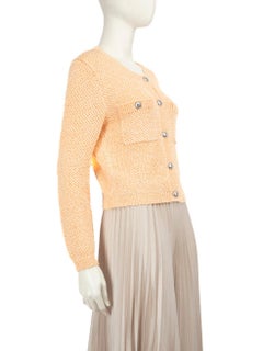 Cardigan in maglia con paillettes arancione di Maje taglia S