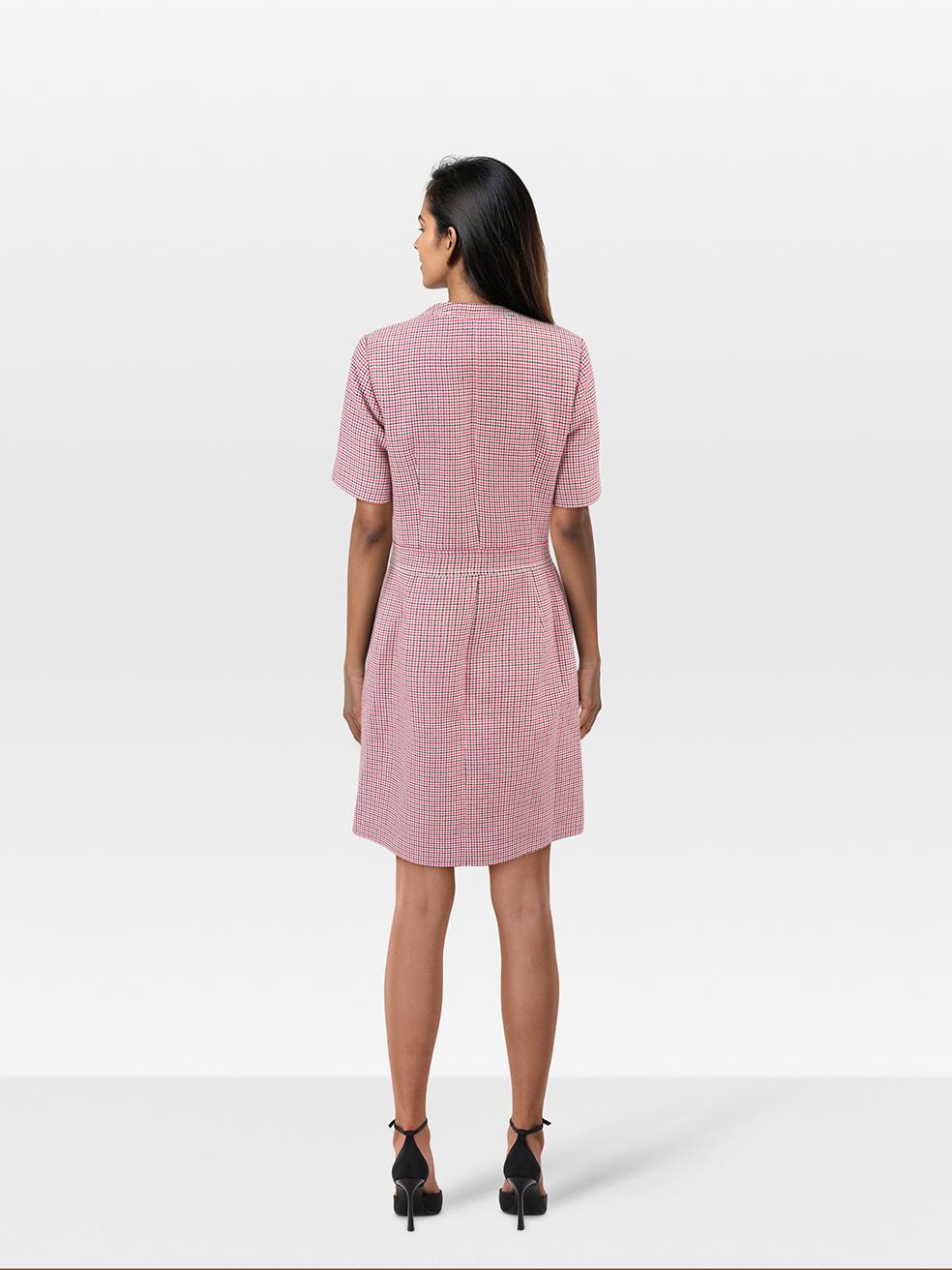 CONDITION is Very Good. Hardly any visible wear to the dress is evident on this used Maje designer resale item.
 
 
 
 Details
 
 
 Pink
 
 Cotton
 
 Dress
 
 Houndstooth pattern
 
 Knee length
 
 Short sleeves
 
 Button up fastening
 
 Faux