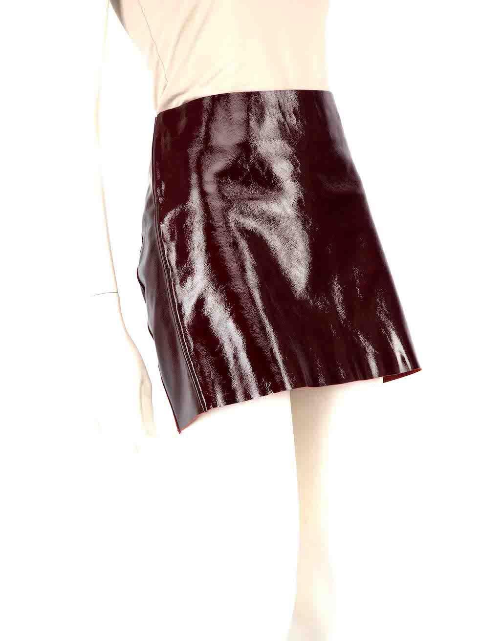 CONDITION is Very good. Minimal wear to the skirt is evident. Small marks to the front right and rear centre of the lining on this used Maje designer resale item.
 
 
 
 Details
 
 
 Red
 
 Patent leather
 
 Skirt
 
 Mini
 
 Back zip fastening
 
