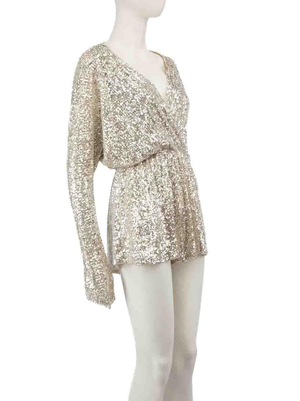 CONDITION is Never worn, with tags. No visible wear to playsuit is evident on this new Maje designer resale item.
 
 
 
 Details
 
 
 Silver
 
 Polyester
 
 Playsuit
 
 Sequinned
 
 Long sleeves
 
 V neckline
 
 Front snap button closure
 
