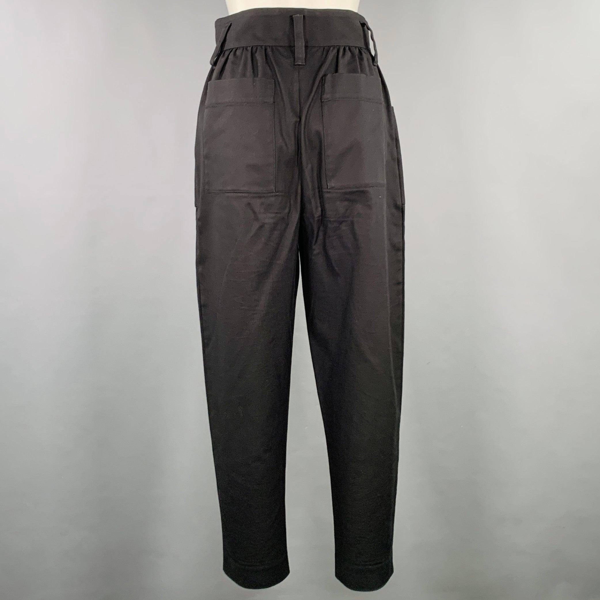 MAJE casual pants
in a
black cotton blend woven fabric featuring a high waisted style, tapered fit, and button fly closure. Excellent Pre-Owned Condition. 

Marked:   IT 38 

Measurements: 
  Waist: 28 inches Rise: 12.5 inches Inseam: 24.5 inches 
 