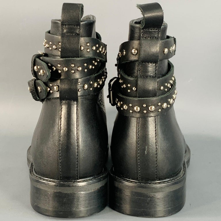 MAJE Taille Bottes à lacets en cuir noir clouté En vente sur