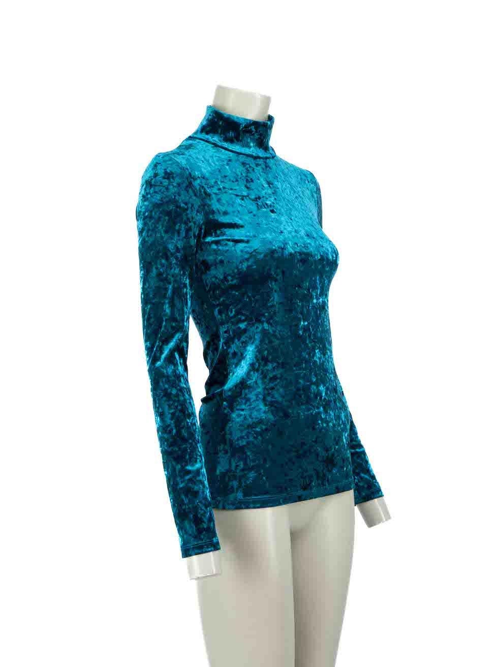 CONDITION is Very good. Hardly any visible wear to top is evident on this used Maje designer resale item.
 
Details
Turquoise
Velvet
Long sleeves top
Turtleneck
Stretchy
 
Made in China
 
Composition
59% Polyester, 32% Polyamide and 9% Elastane
