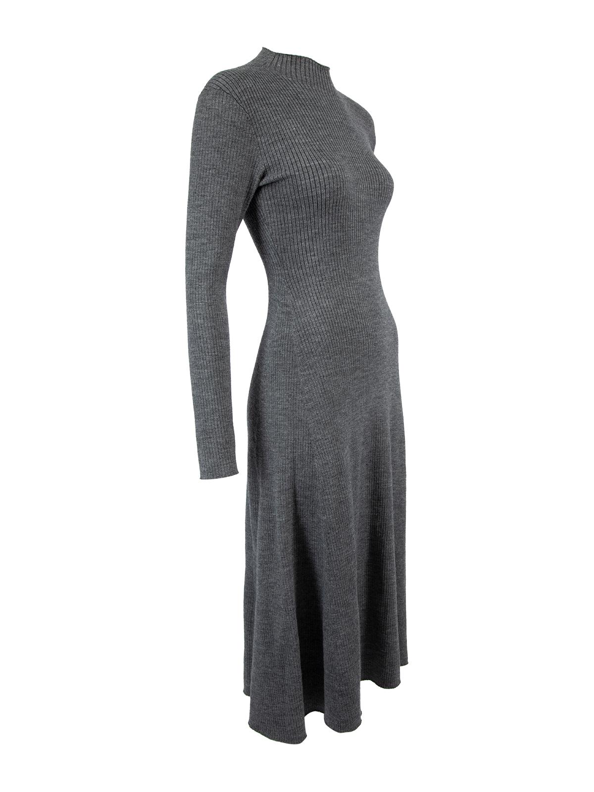 CONDITION is Very Good. Very light piling is visible on areas such as the underarms, neckline and hem of this dress. There is no other wear to this used Maje designer resale item.  Details  Grey Knit Acrylic, wool blend High neck Long sleeves Midi