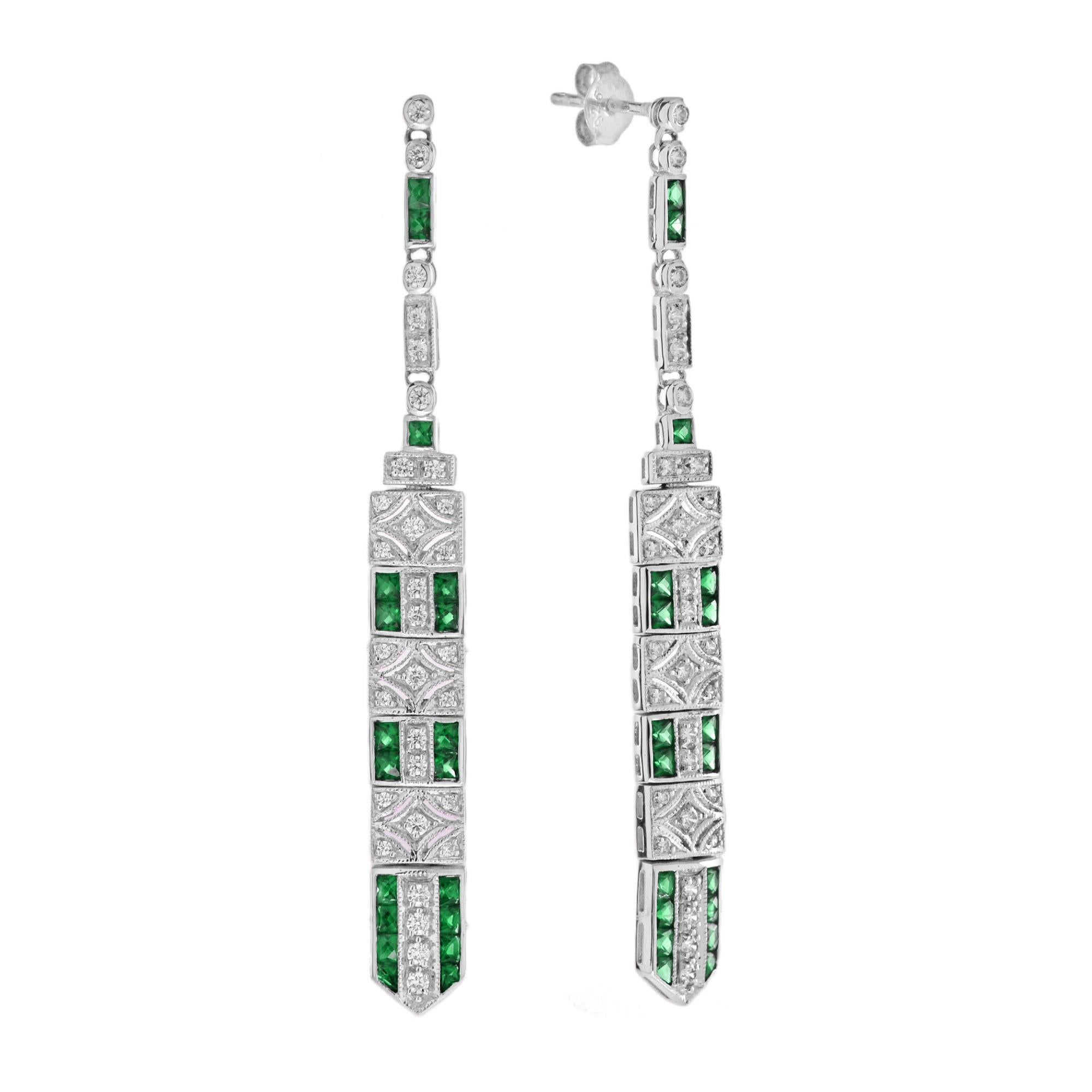 These art deco bar dangle earrings and link bracelet are the epitome of vintage-inspired elegance featuring mesmerizing geometric patterns feature with emerald and diamonds. 

Earrings Information

Metal: 14K White Gold
Width: 6 mm.
Length: 62