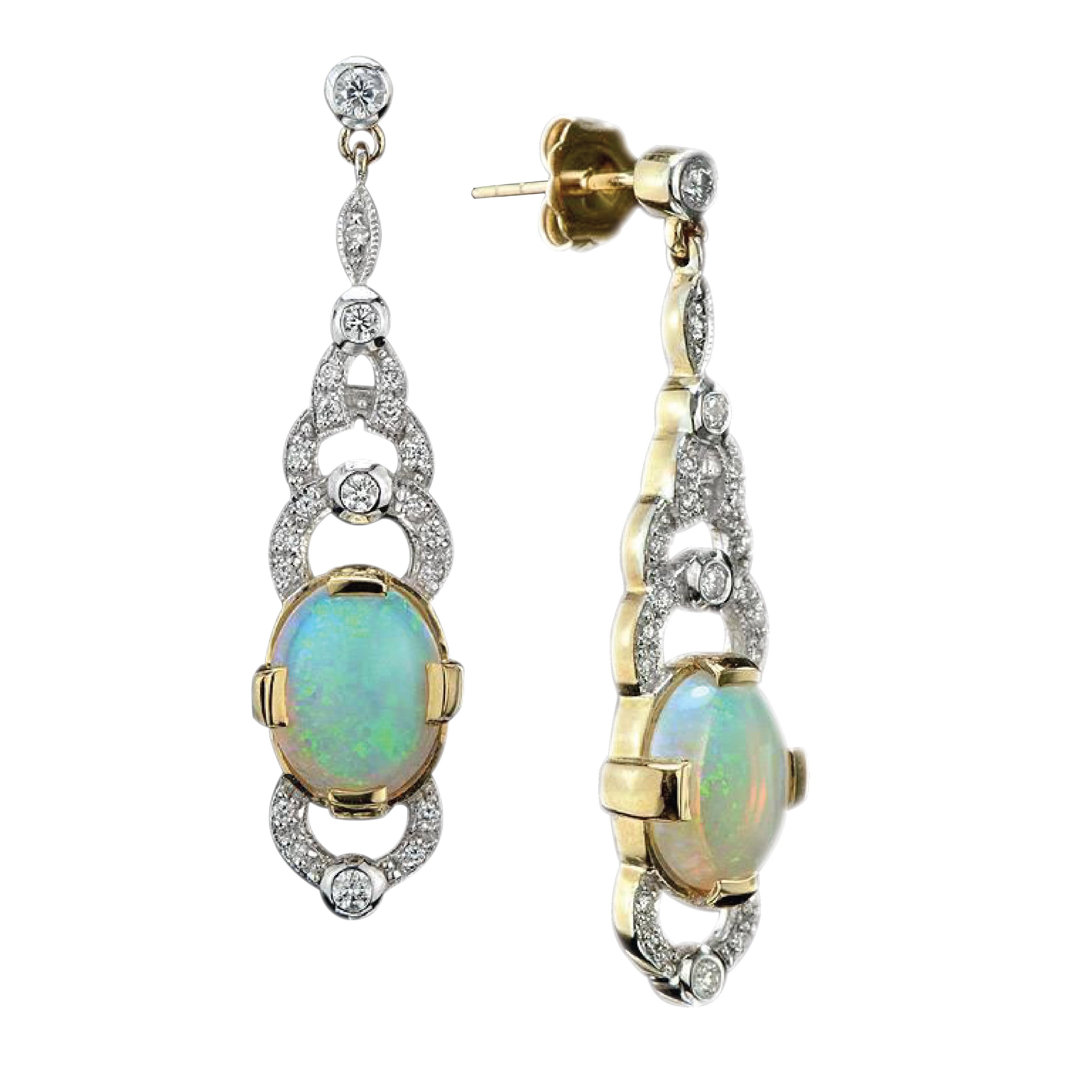 A pair of Art Deco style natural Australian opal and diamond drop earrings, each earring comprising an oval shape natural opal to the center of an open work diamond-set cluster above and below. Elegant and feminine, these articulated pendant