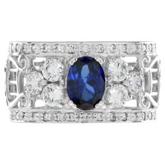 Oval Ceylon Sapphire and Diamond Wide Band in 18K White Gold