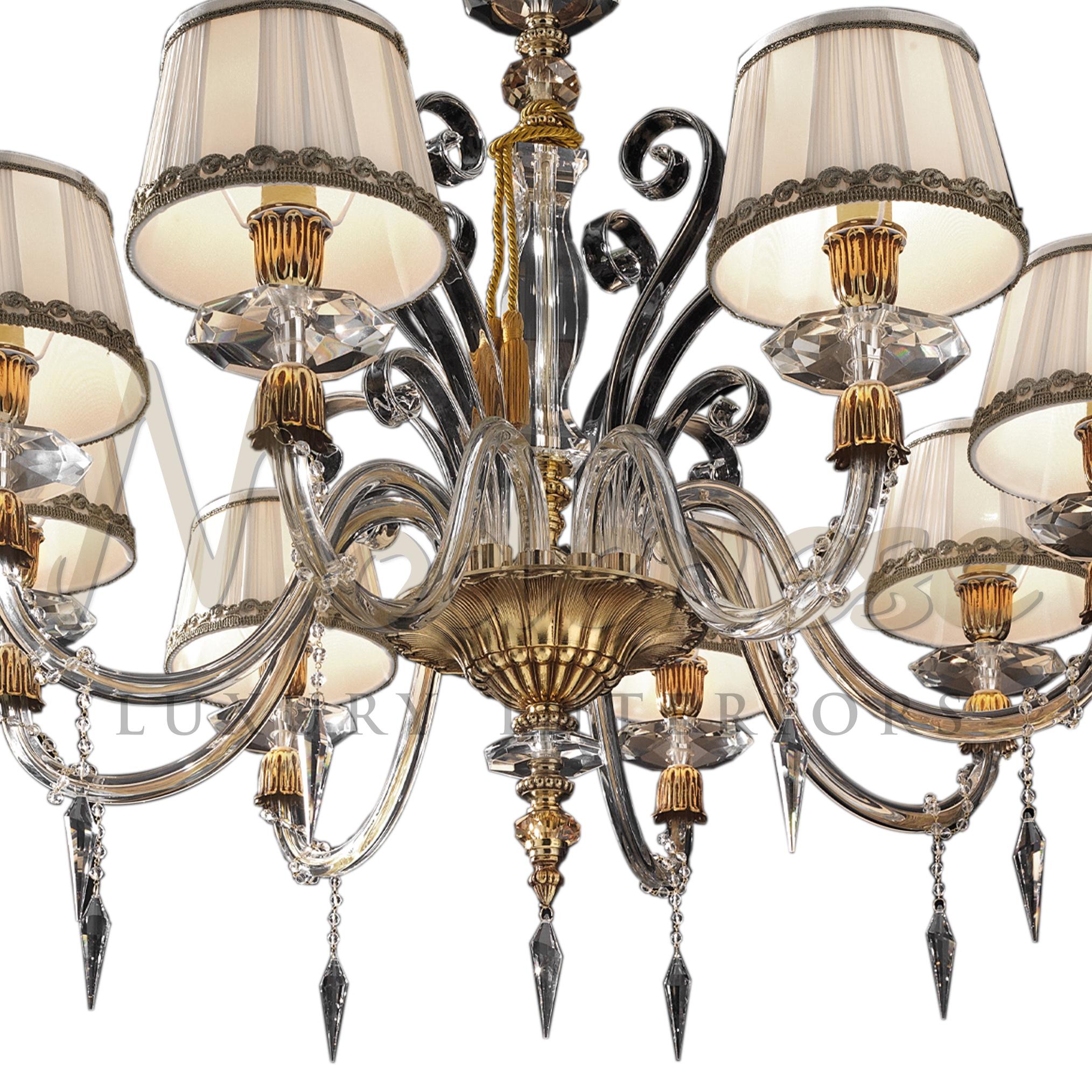 Let yourself be seduced by this transparent crystal chandelier with amber details and french gold metal finish that will transform any room and create a feeling of eternal celebration, brilliance and luxury. This model requires 8 single E14 screw