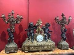 Majestic 19th Century French Gilt Bronze Candelabras and Clock Garniture