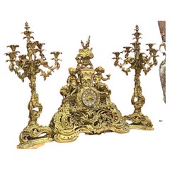 Majestic 19th Century French Gilt Bronze Candelabras and Clock Garniture