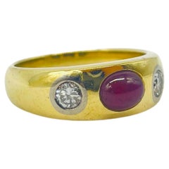 majestic 3 stone ring with diamond and ruby in 18k yellow gold