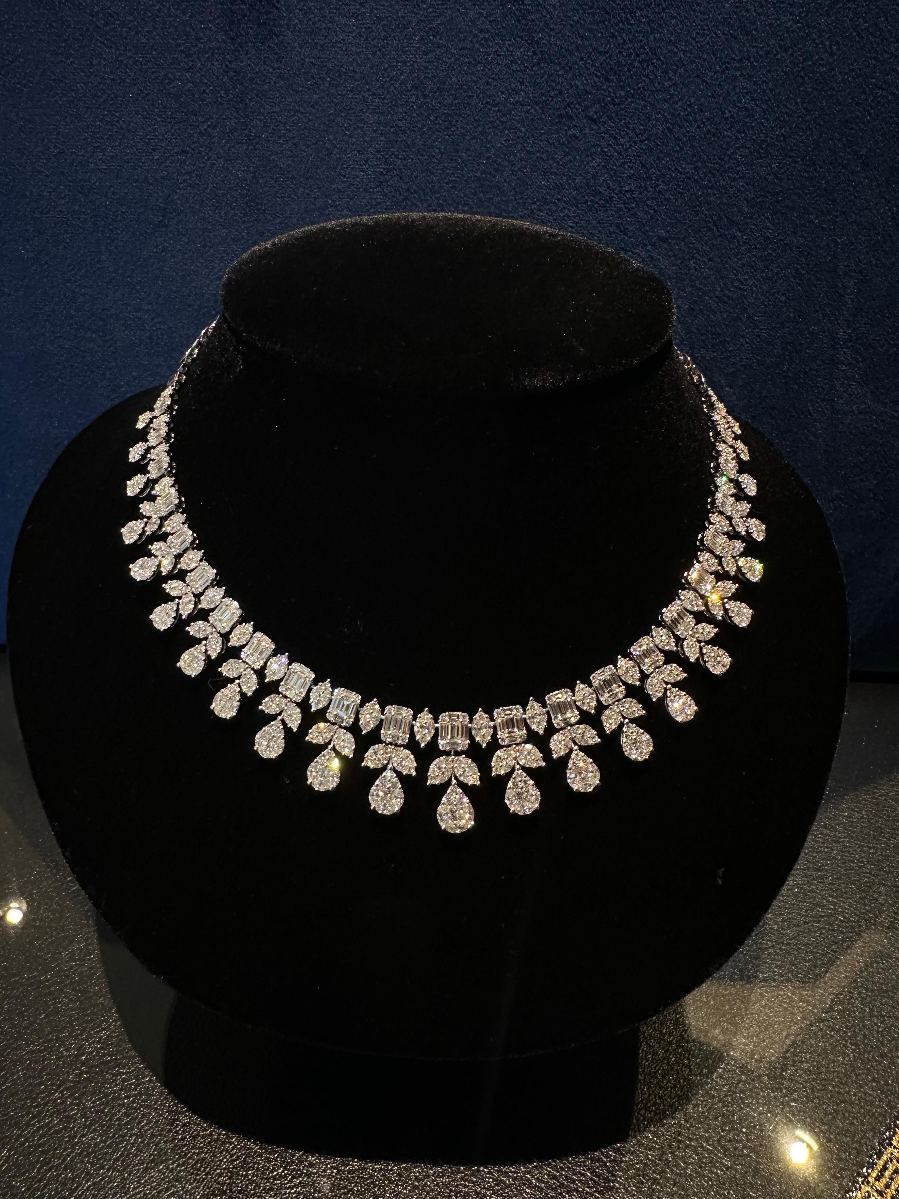 Very majestic, ladies 18 karat white gold, 45 carat diamond princess style necklace highlights the beauty of its’ stones with extreme fluidity and elegance, and seamlessly floats against the skin. Necklace features sparkling marquise, princess,