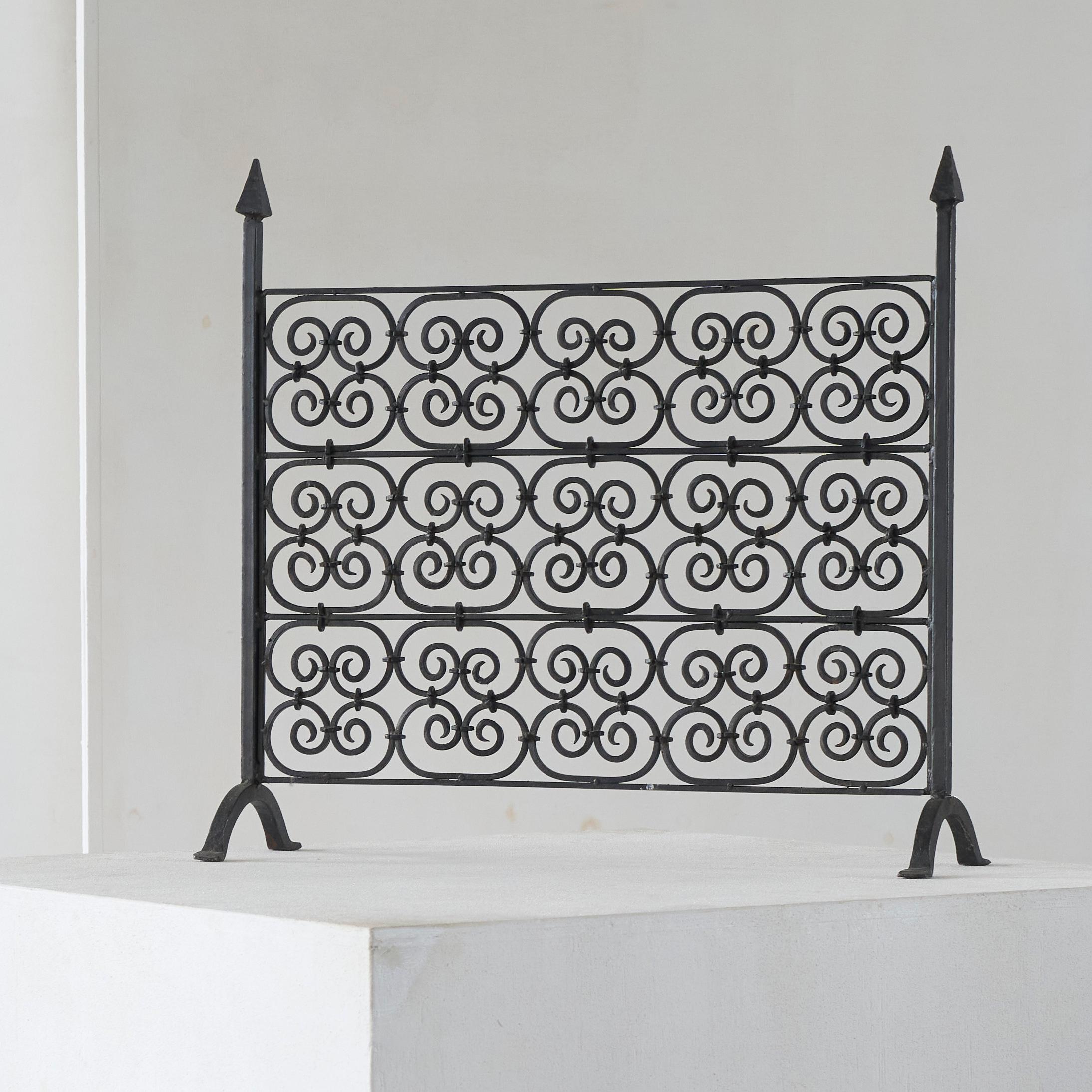 Majestic Antique Fire Screen in Wrought Iron Late 19th Century.

Monumental and majestic looking antique fire screen in wrought iron. Wonderful details and hand made quality all over. Great artistic design yet very timeless and modest at the same