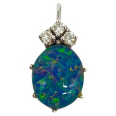 Majestic art deco Chain pendant with diamond and blue opal in 14k gold