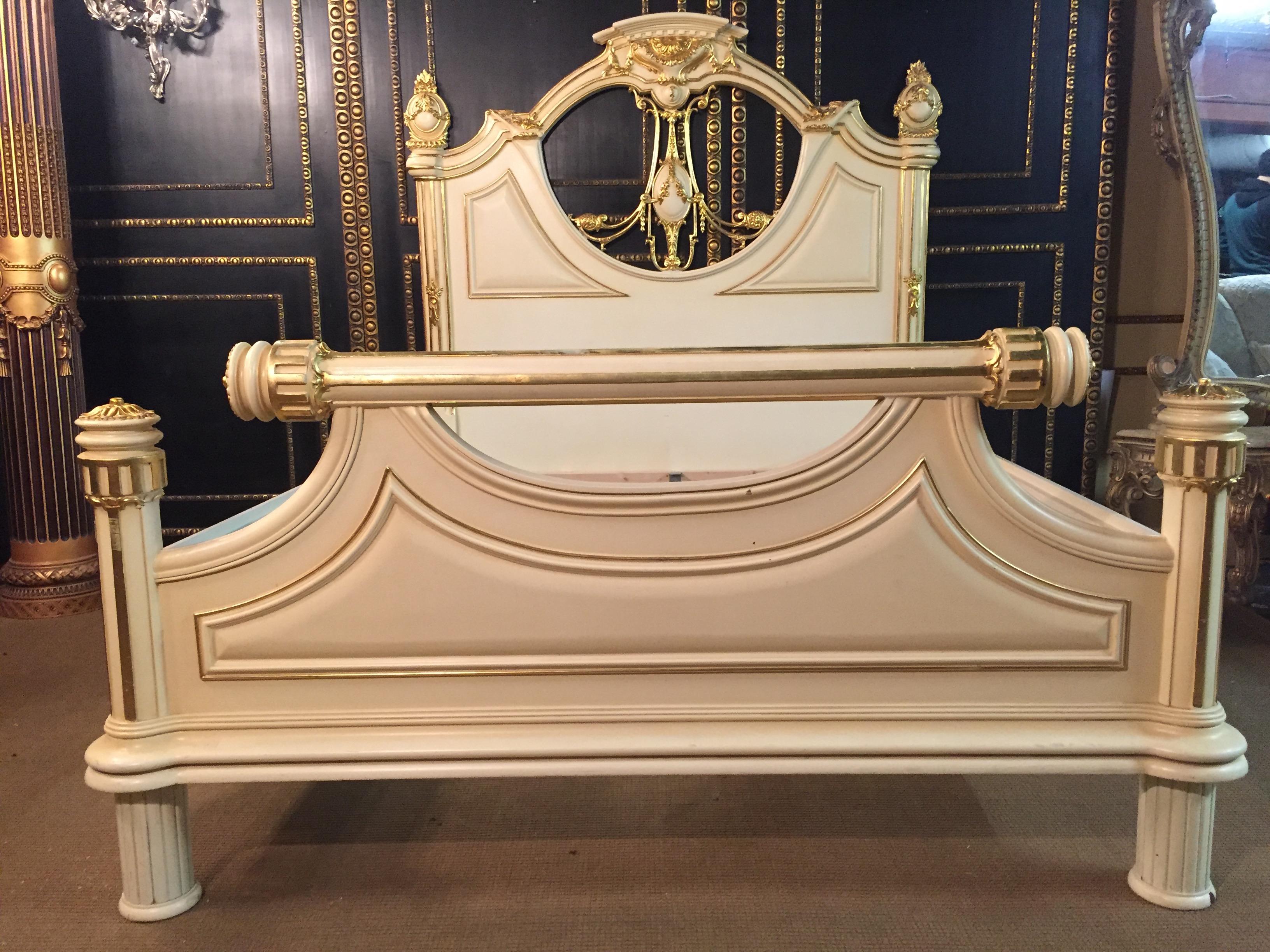Majestic Baroque bed in the style of Louis XVI. Solid beechwood, finely carved, colored and gilded. Low foot and high headboard, double braided, curved backrest framing. Openwork rocaille crowning. Internal dimension for mattress is 180 cm x 200