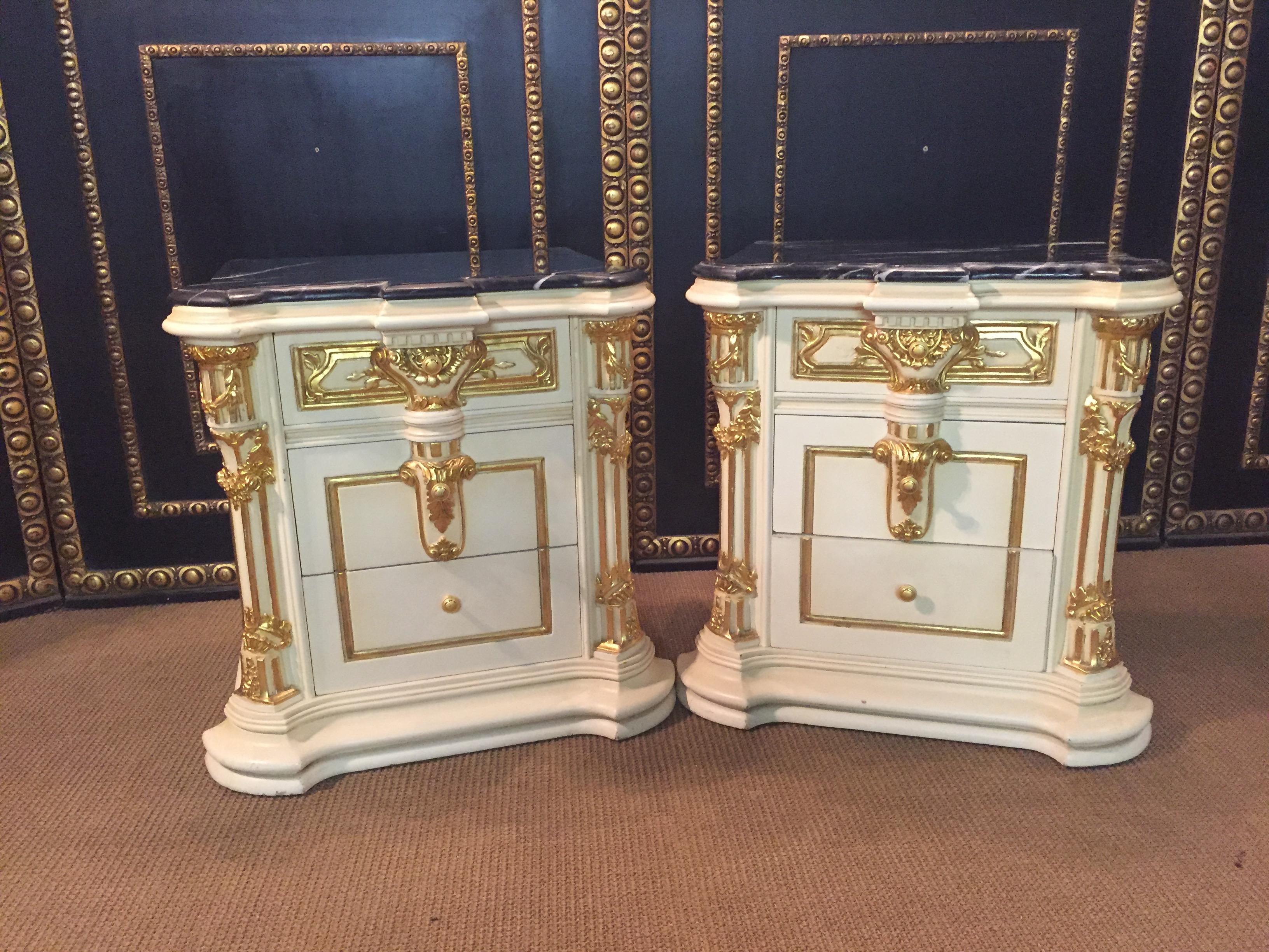 2 Majestic Baroque bedside commode in the style of Louis XVI. Solid beechwood, finely carved, colored and gilded.
 