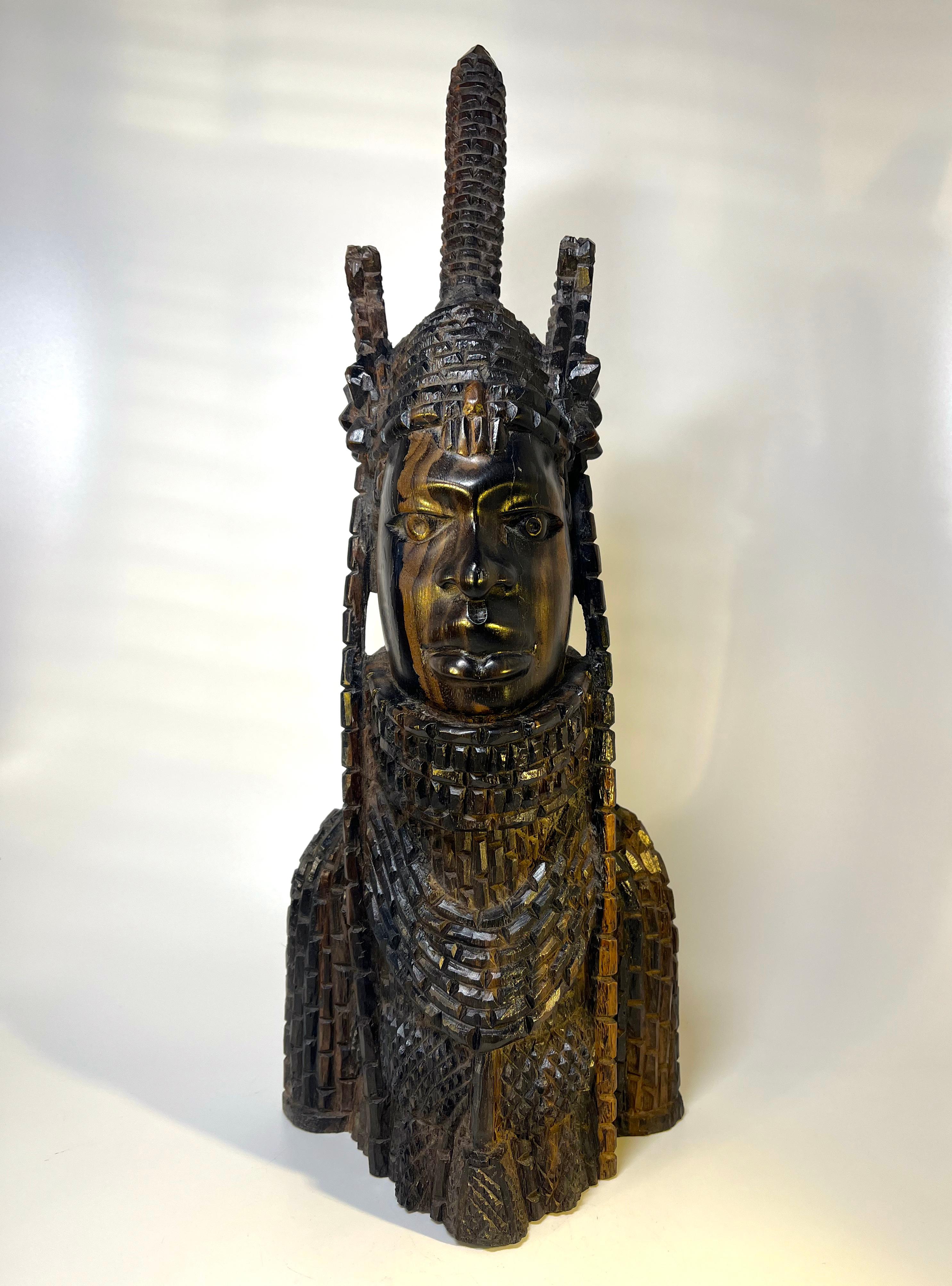 Truly a majestic Benin Oba. Beautifully and finely hand carved in Ebony hardwood from the 1930's
A piece of this quality and stature holds enormous presence
Height 17.75 inch, Width 6.75 inch, Depth 4.75 inch
Circa 1930's
A heavy and striking