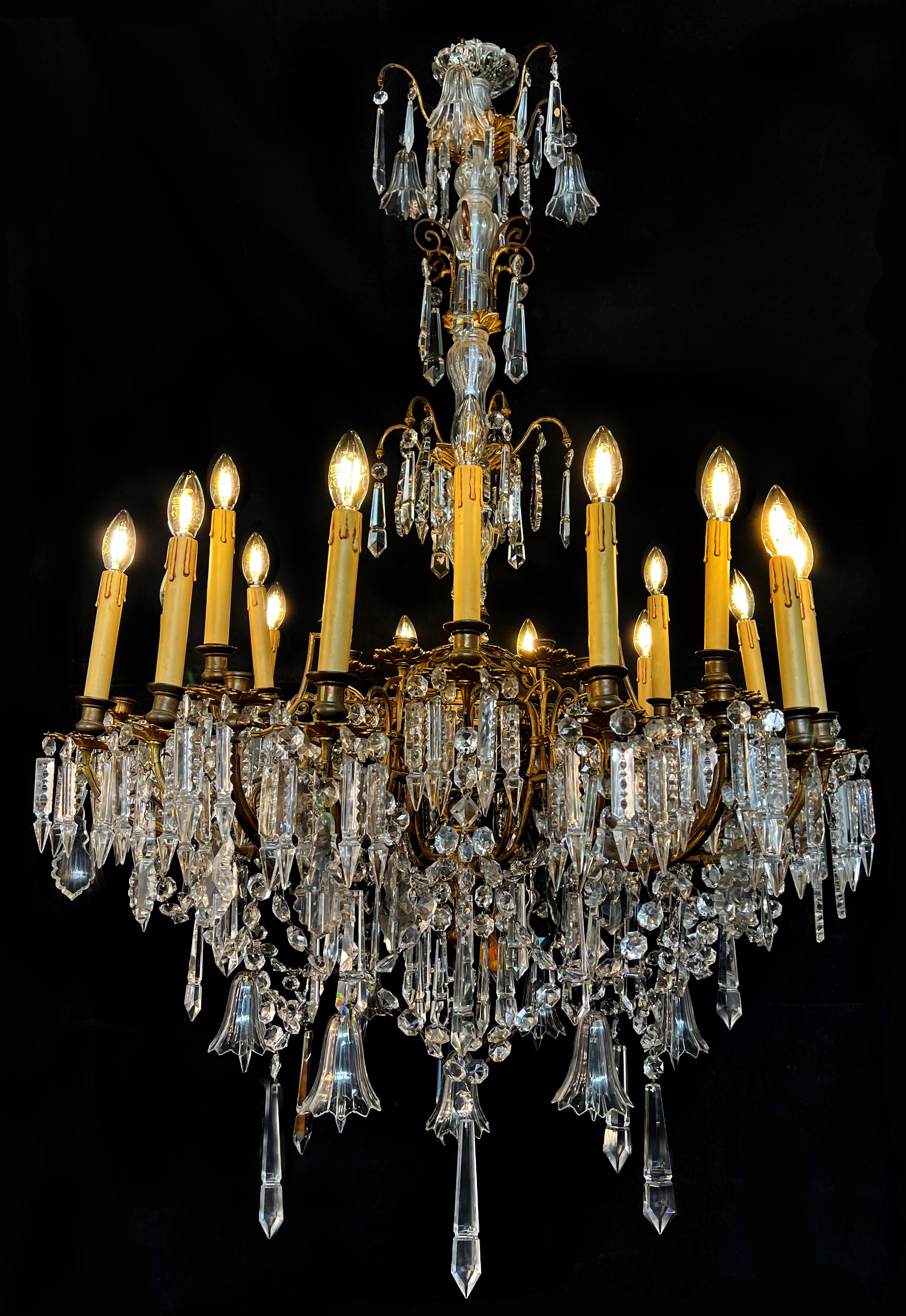 Large bohemian crystal chandelier. It was located in a luxurious apartment across the street from Vienna's Burgtheater.  14 lights illuminating hundreds of sparkling crystals made of pure Bohemia glass. 