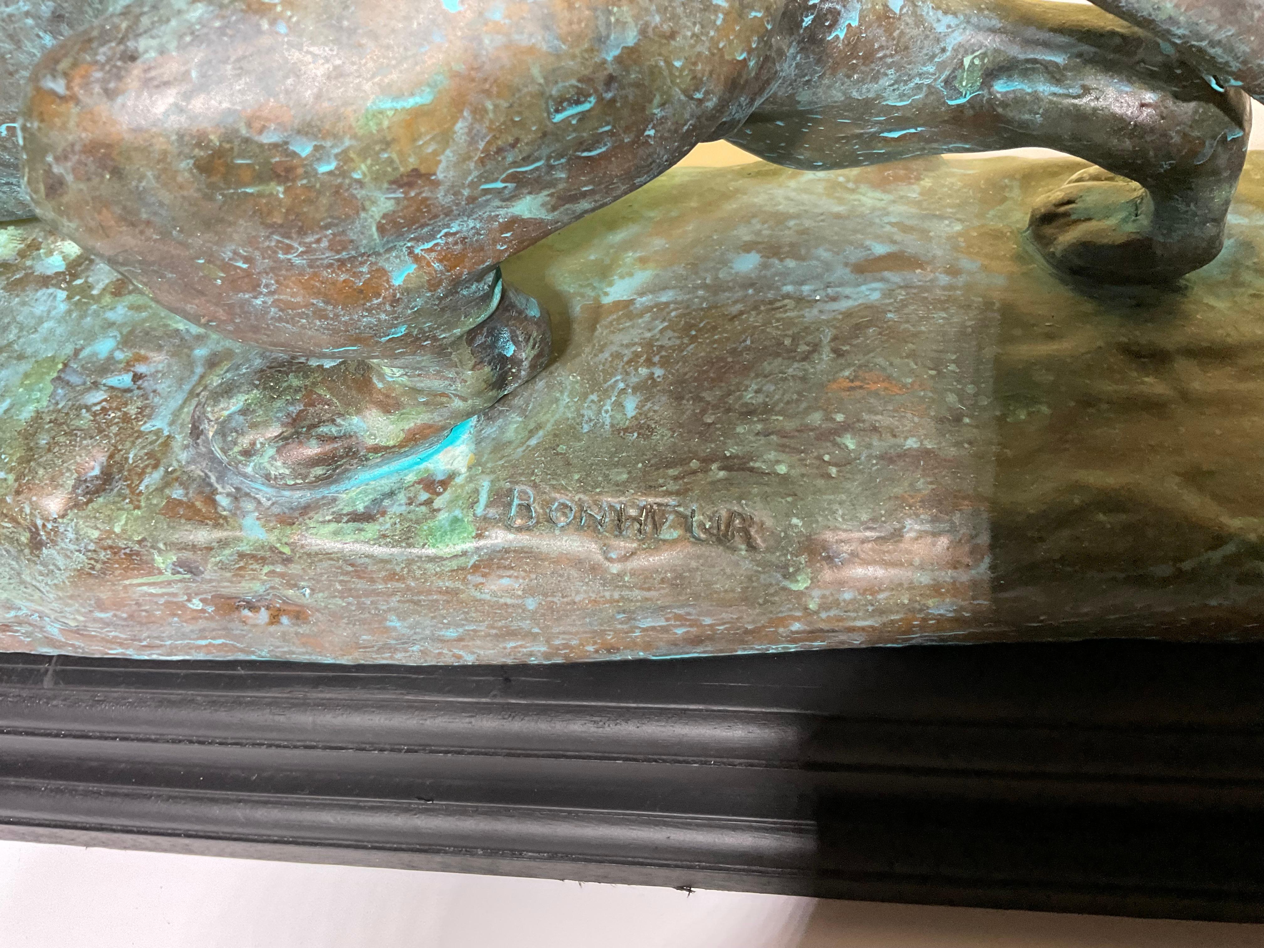 Majestic scultura di leone in rame e composito: una dichiarazione di potenza e abilità artistica in vendita 1