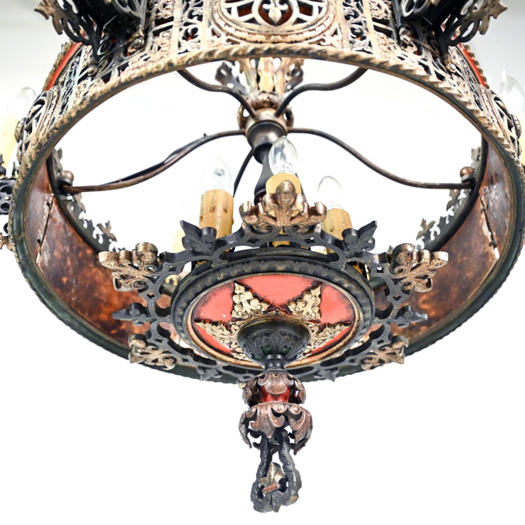 Designed by Arthur Krause for Lion Electric Manufacturing Company in 1927 this gilt and painted pierced bronze chandelier is an exceptional & large. It is finished with Polychrome highlights & mica-lined gallery of six Edison interior lights