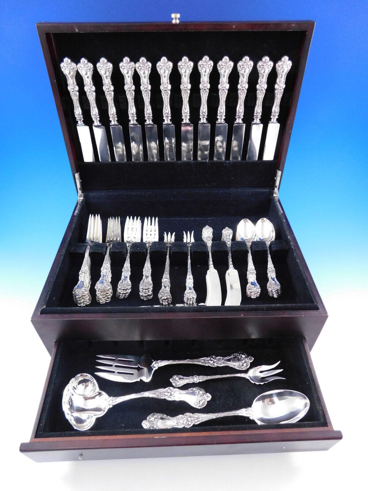 Beautiful Majestic by Alvin sterling Silver flatware set - 77 pieces. This floral multi-motif pattern was introduced in the year 1900. This set includes:


12 Knives with blunt silverplated blades, 8 3/4