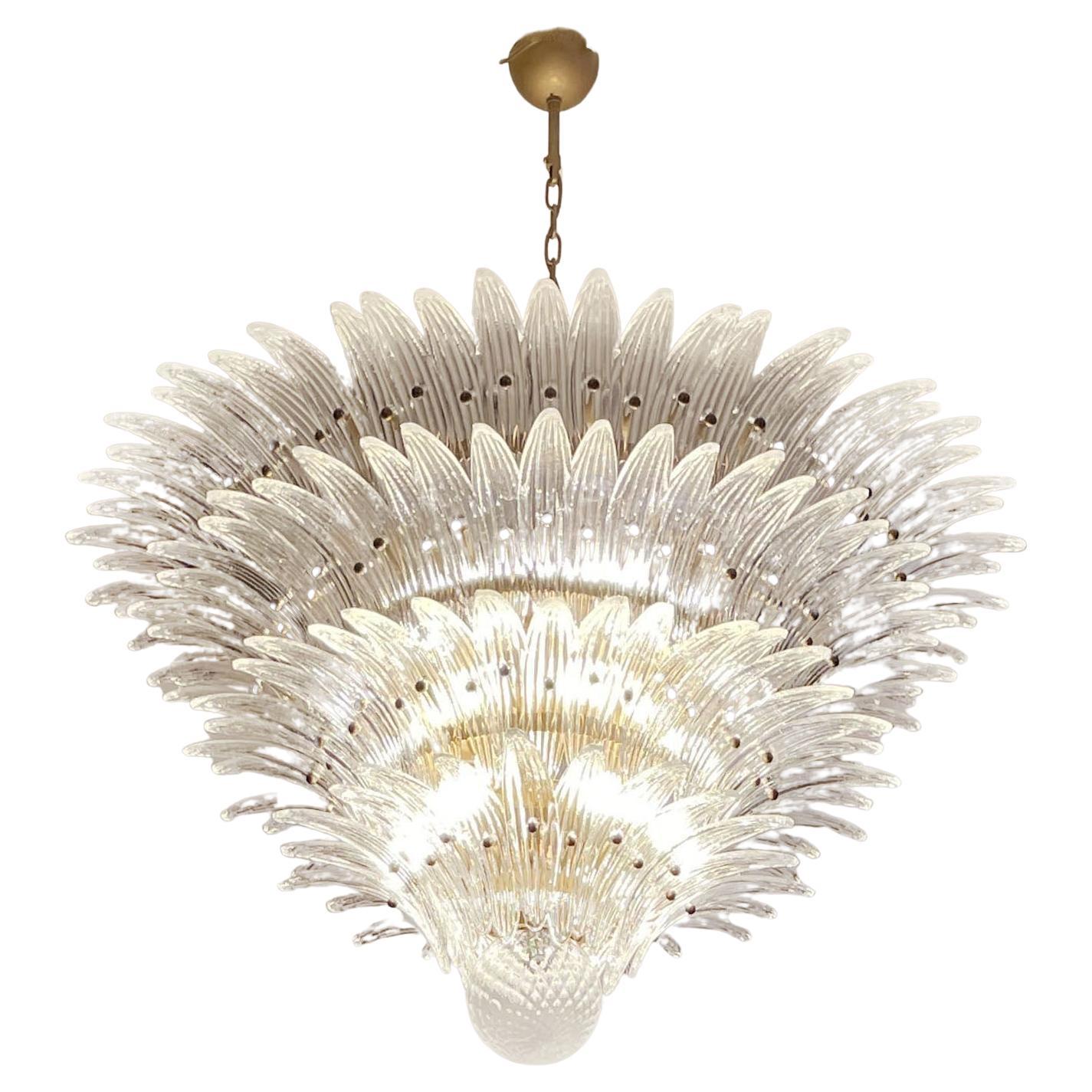 Luxury Murano Palmette ceiling light made by 163 Murano trasparent glasses in a gold metal frame. Murano blown glass in a traditional way. Structure in gold colored metal.
Period: 1980's
Dimensions: 55,10 inches (140cm) height with chain; 31,50