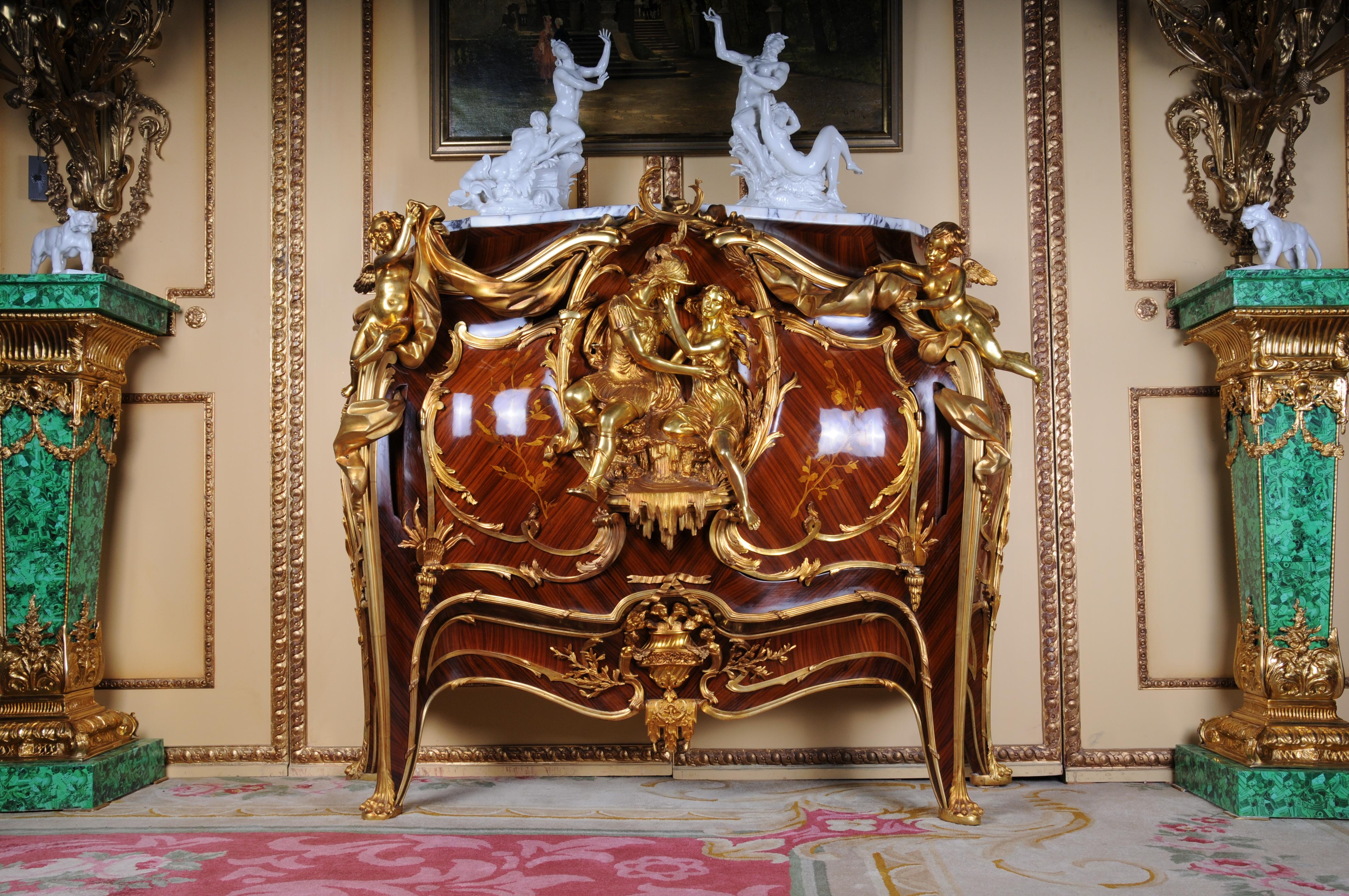 Majestic chest of drawers designed by Francois Linke & Leon Massagé, Paris

Royal chest of drawers based on a design by Francois Linke.
Rich gilded bronze applications in three-dimensional decorations and figures.

Material: oak, rosewood, kingwood,