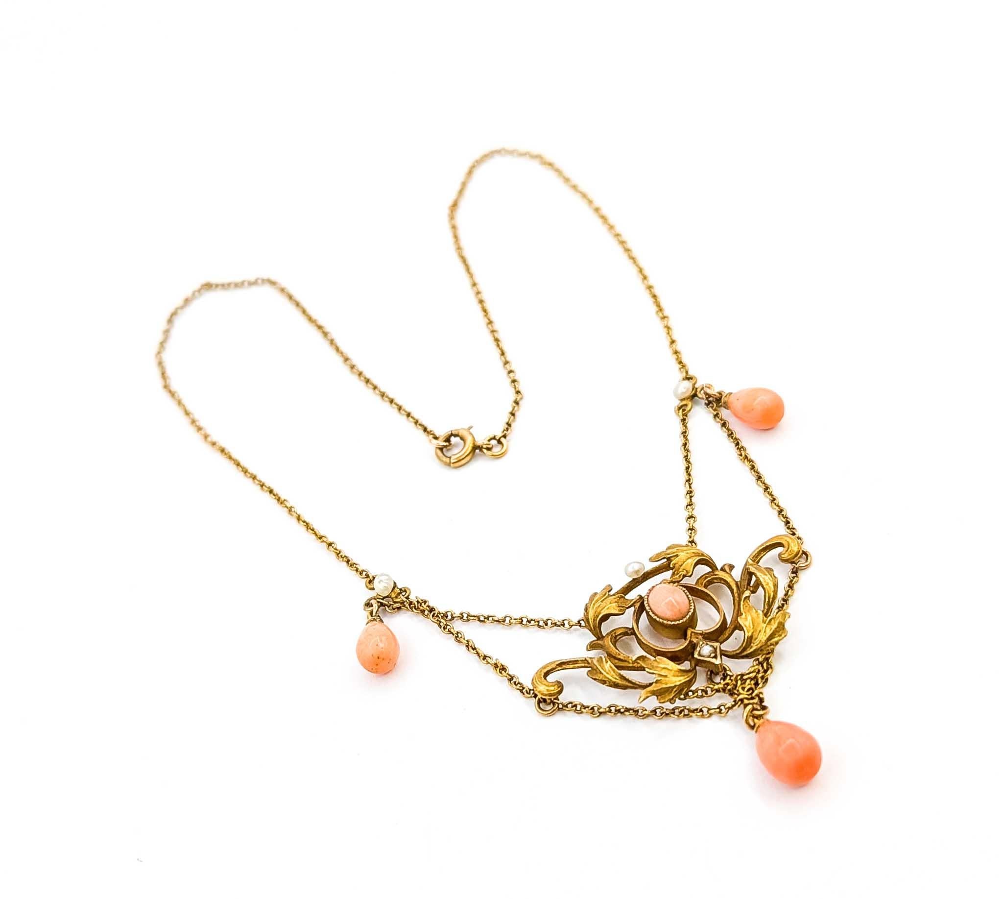 Majestic Coral and Seed Pearl 10k Gold Necklace

Introducing this exquisite necklace lavalier, crafted in luxurious 10k gold. This piece showcases a harmonious blend of vibrant coral and delicate seed pearls, arranged in an elegant setting that