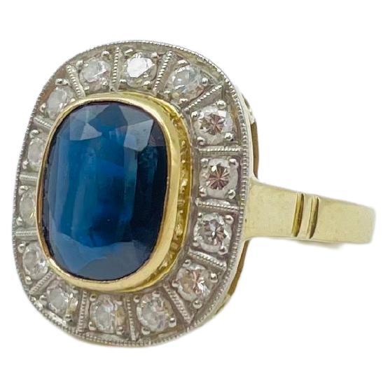 
Indulge in the captivating allure of this exquisitely crafted masterpiece, a dreamlike vision in the form of a breathtakingly beautiful dark blue sapphire ring. Nestled gracefully at its center is a traumhaft schön (stunningly beautiful) oval-cut
