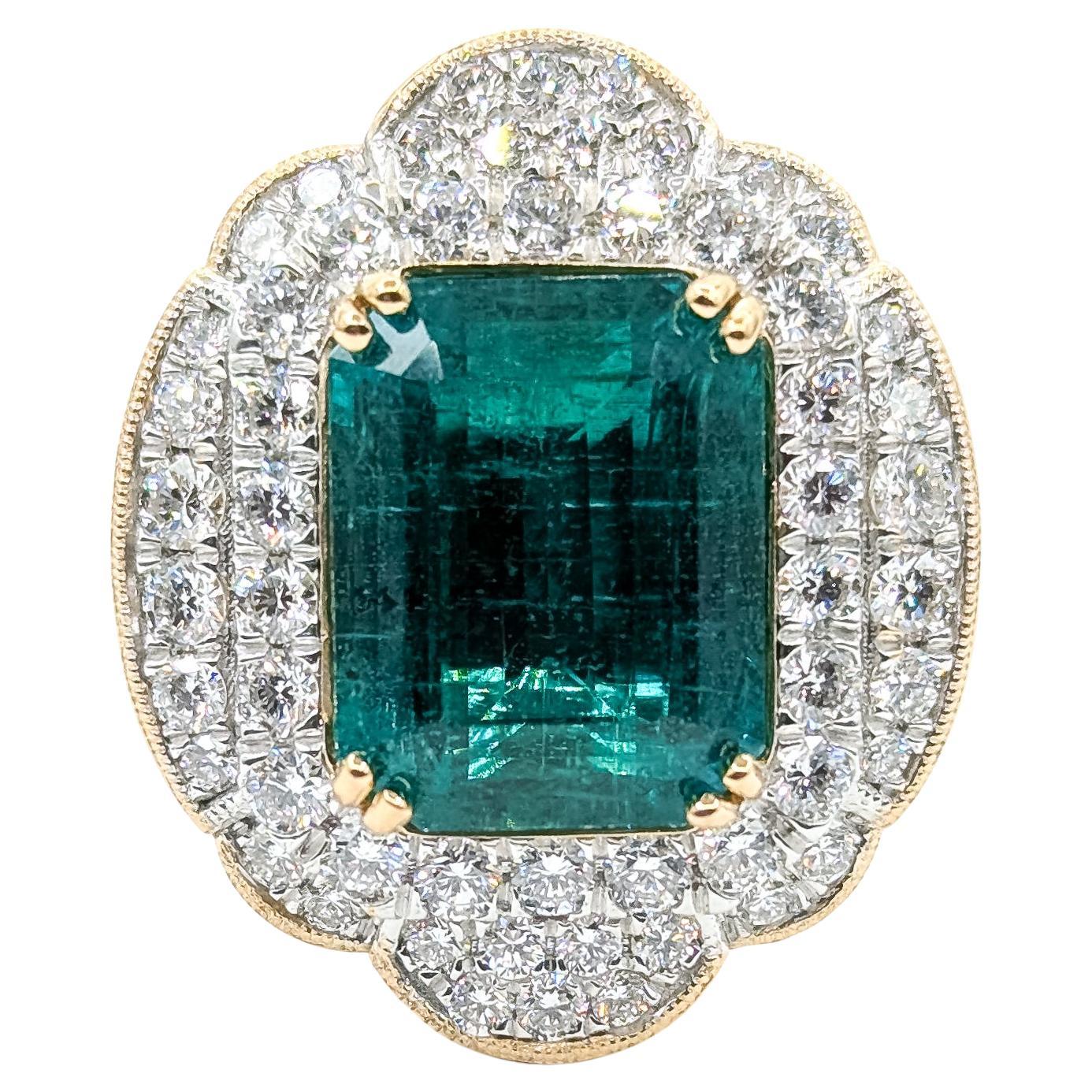 Majestic Anello con smeraldo e diamante a raggiera in platino