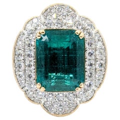 Majestic Anello con smeraldo e diamante a raggiera in platino